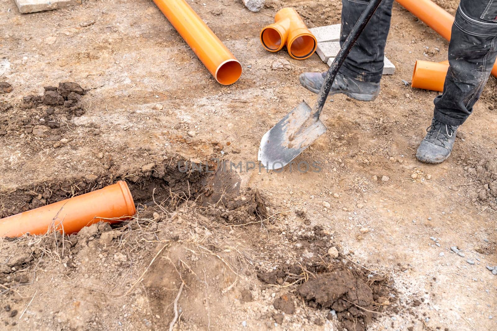 plastic pvc waste sewer pipe in the ground. High quality photo
