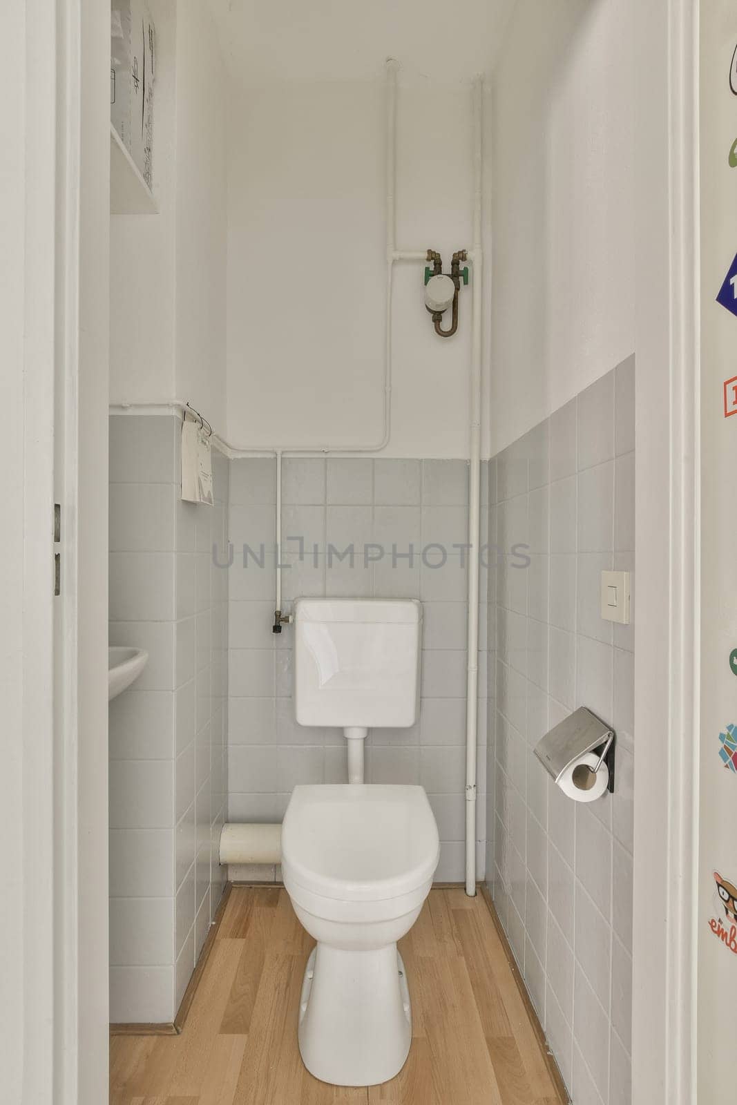 a small bathroom with a toilet and a shower by casamedia