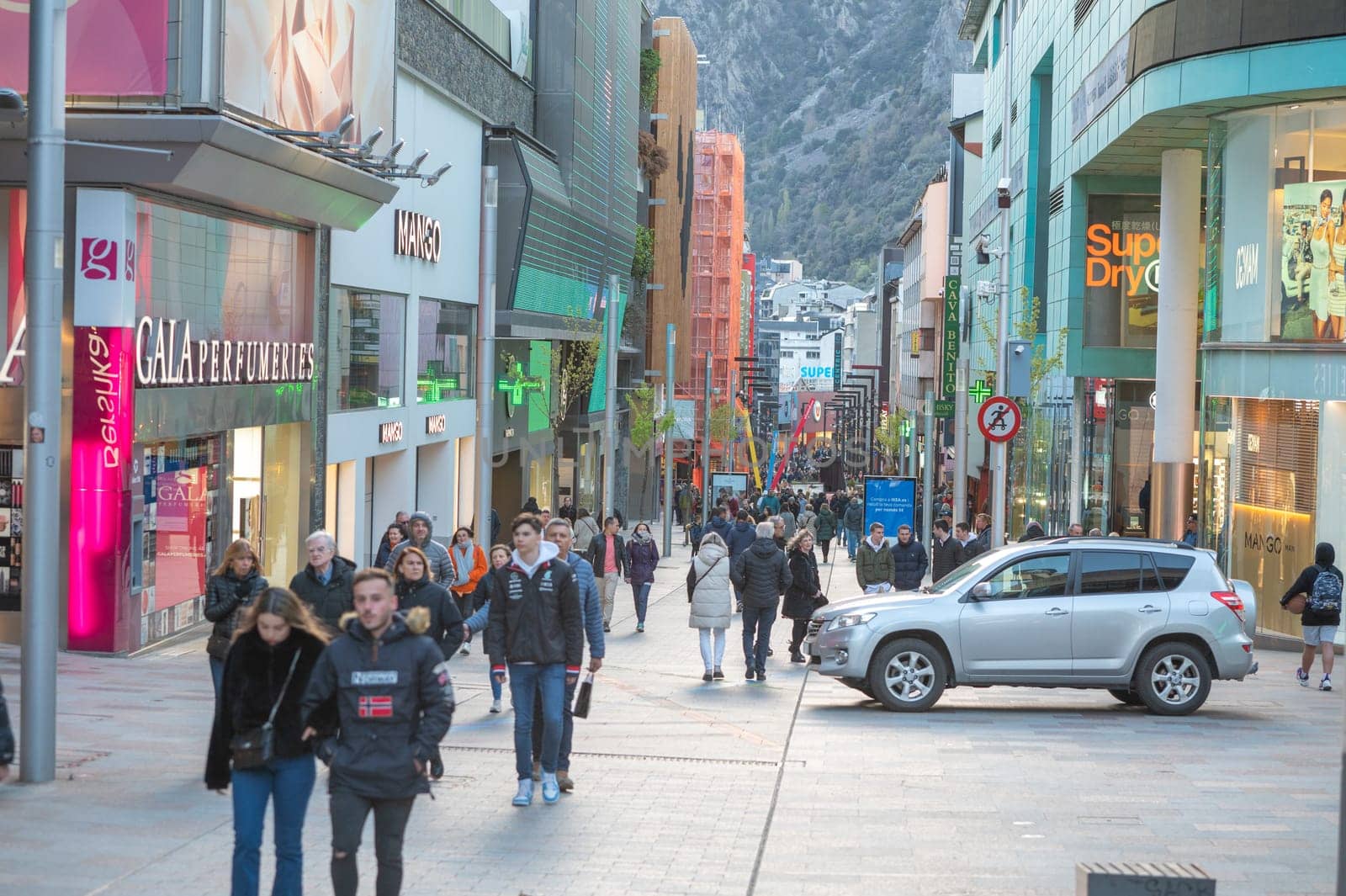Andorra La Vella, Andorra : 2023 Aprill 15 : People Walk in the Comercial Street named Meritxell. Andorra la Vella, Andorra in winter.