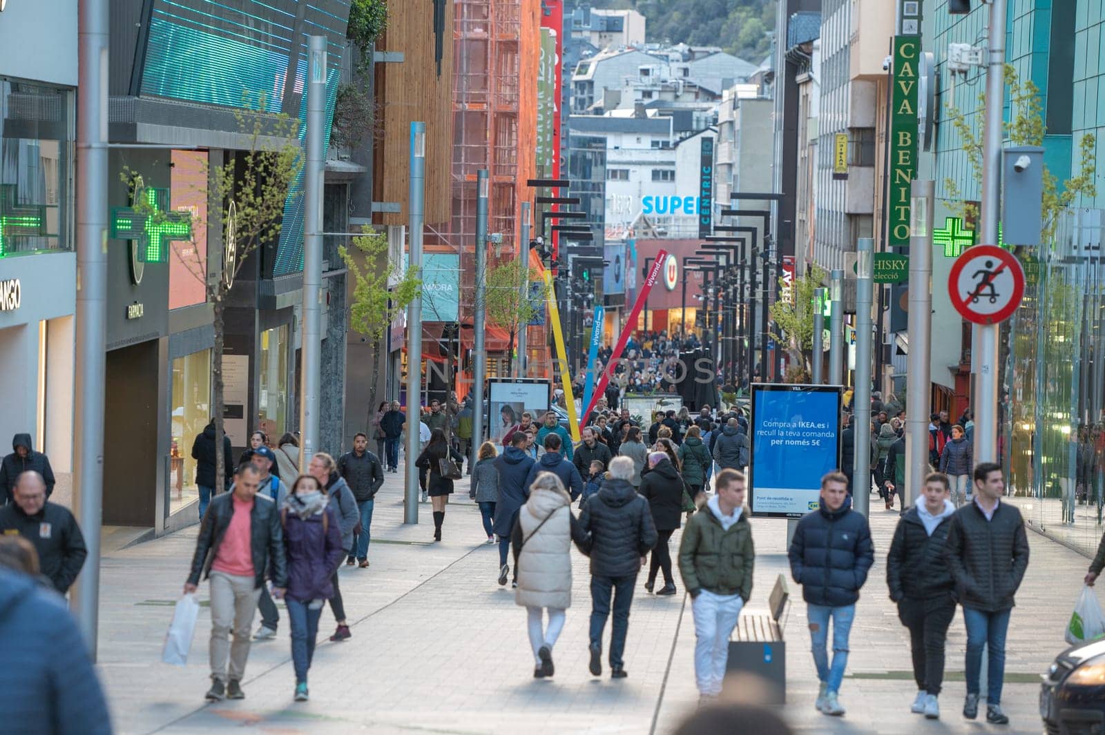 Andorra La Vella, Andorra : 2023 Aprill 15 : People Walk in the Comercial Street named Meritxell. Andorra la Vella, Andorra in winter.