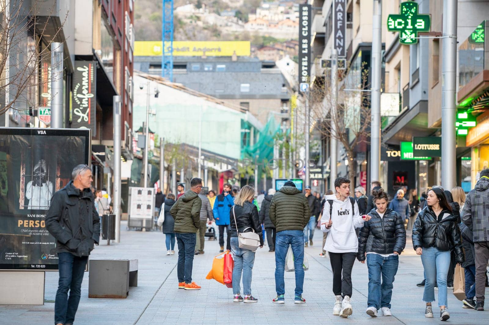 Andorra La Vella, Andorra : 2023 Aprill 15 : People Walk in the Comercial Street named Meritxell. Andorra la Vella, Andorra in winter.