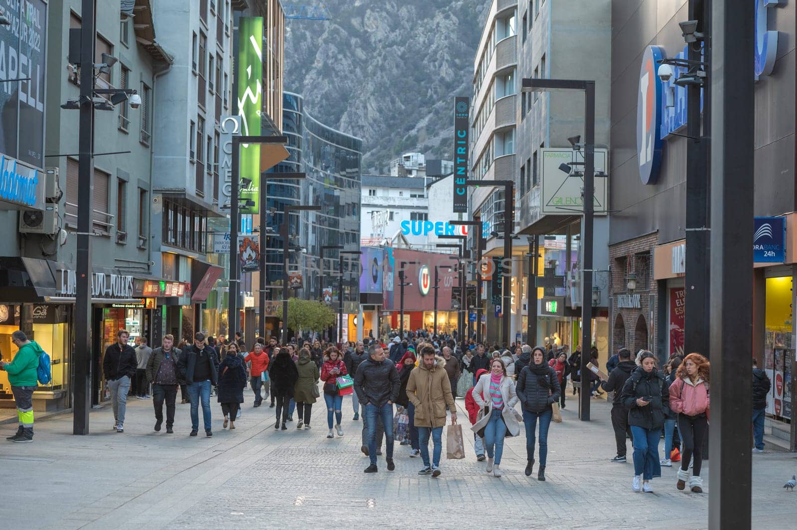 People Walk in the Comercial Street named Meritxell. Andorra la Vella, Andorra in winter. by martinscphoto