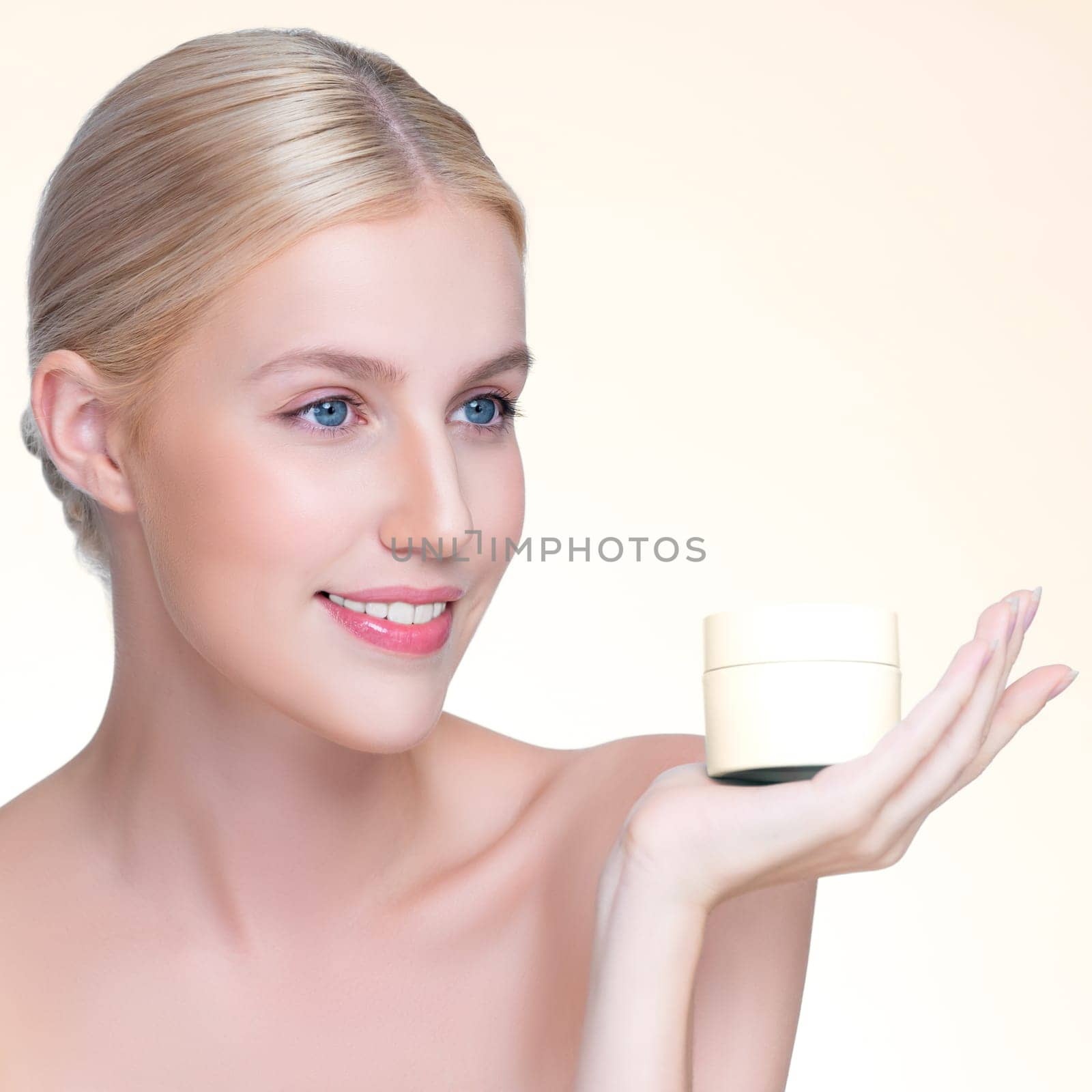 Personable perfect skin woman holding mockup moisturizer product. by biancoblue