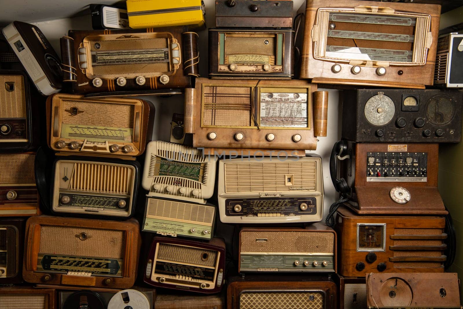 Collection of retro radio and telephone receivers circa 1950. Listening to music. Vintage instagram old style filtered photo, High quality photo