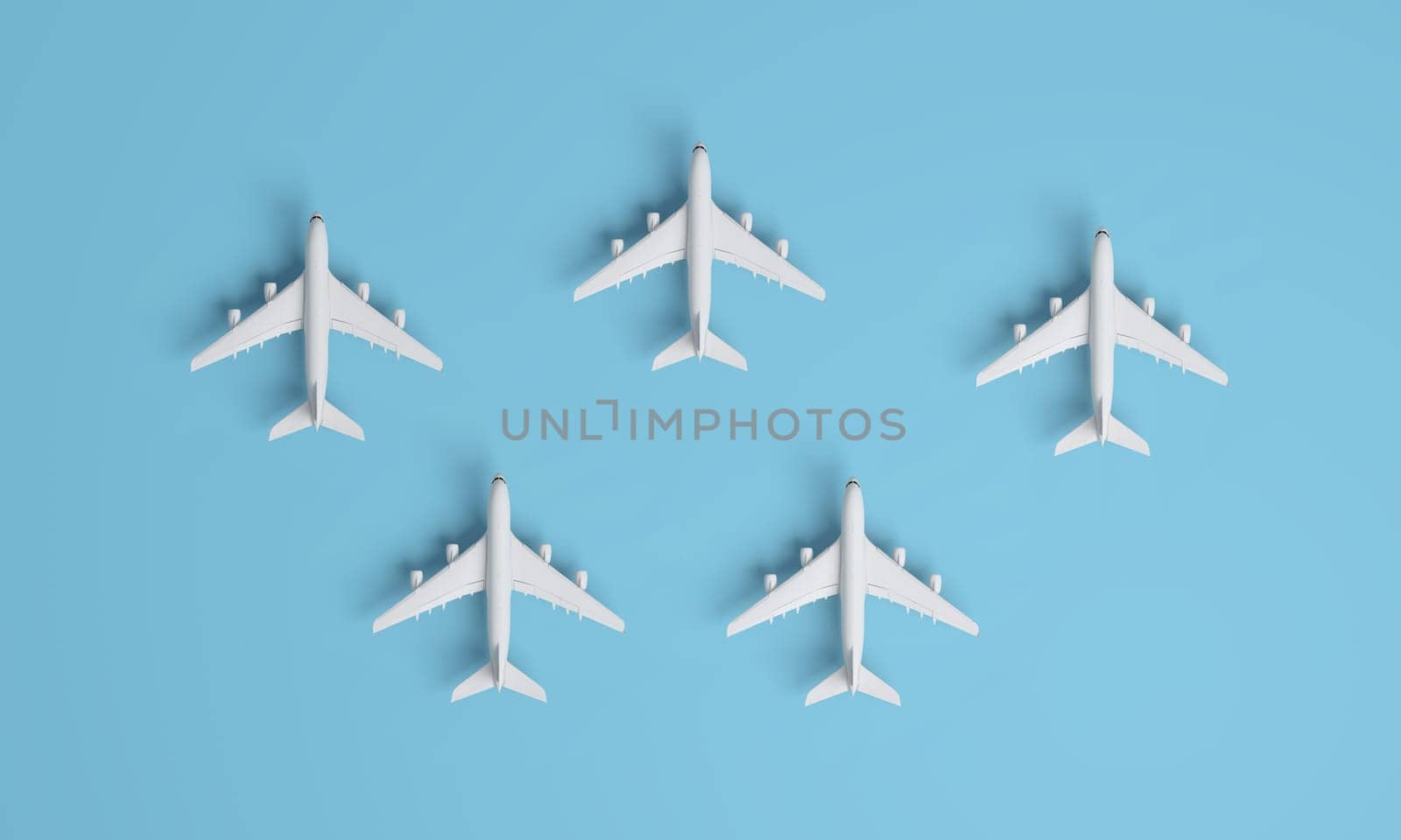 Different holiday or business trip destinations, airplanes on a blue background. 3D rendering.