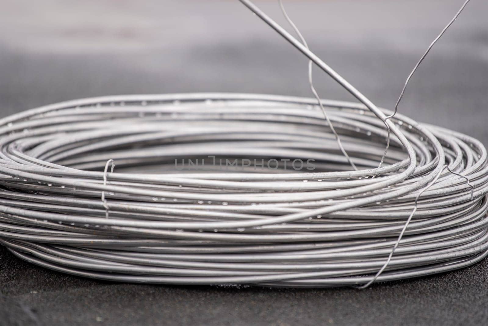 Thick aluminum wire for grounding buildings. Grounding wire to protect the building structure from short circuit. by SERSOL