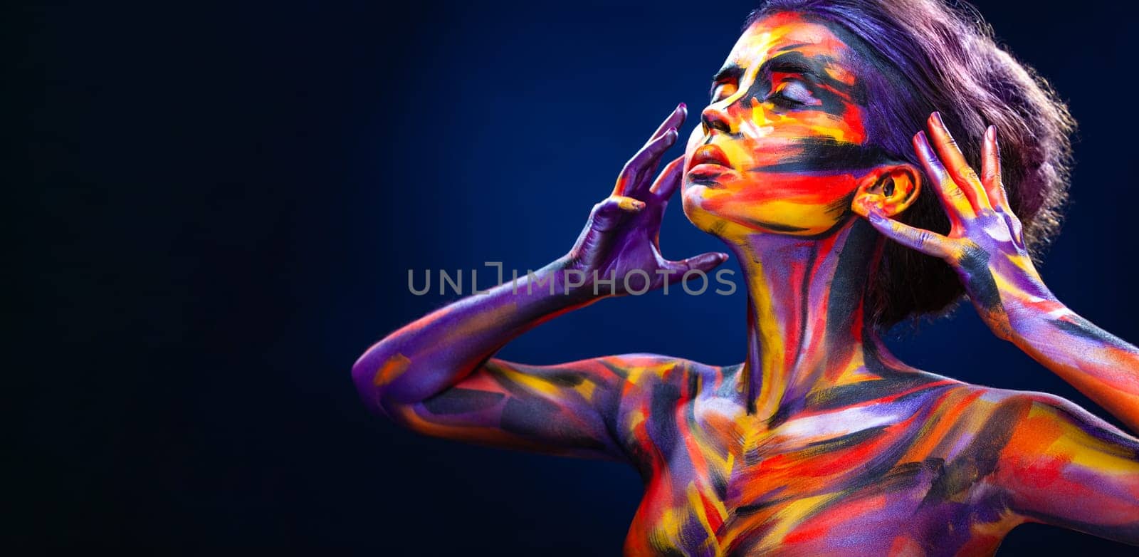 A girl in a glowing neon circle. Woman in color body painting on her face. Cover art for your mixtape, video, song or podcast. Design for book cover