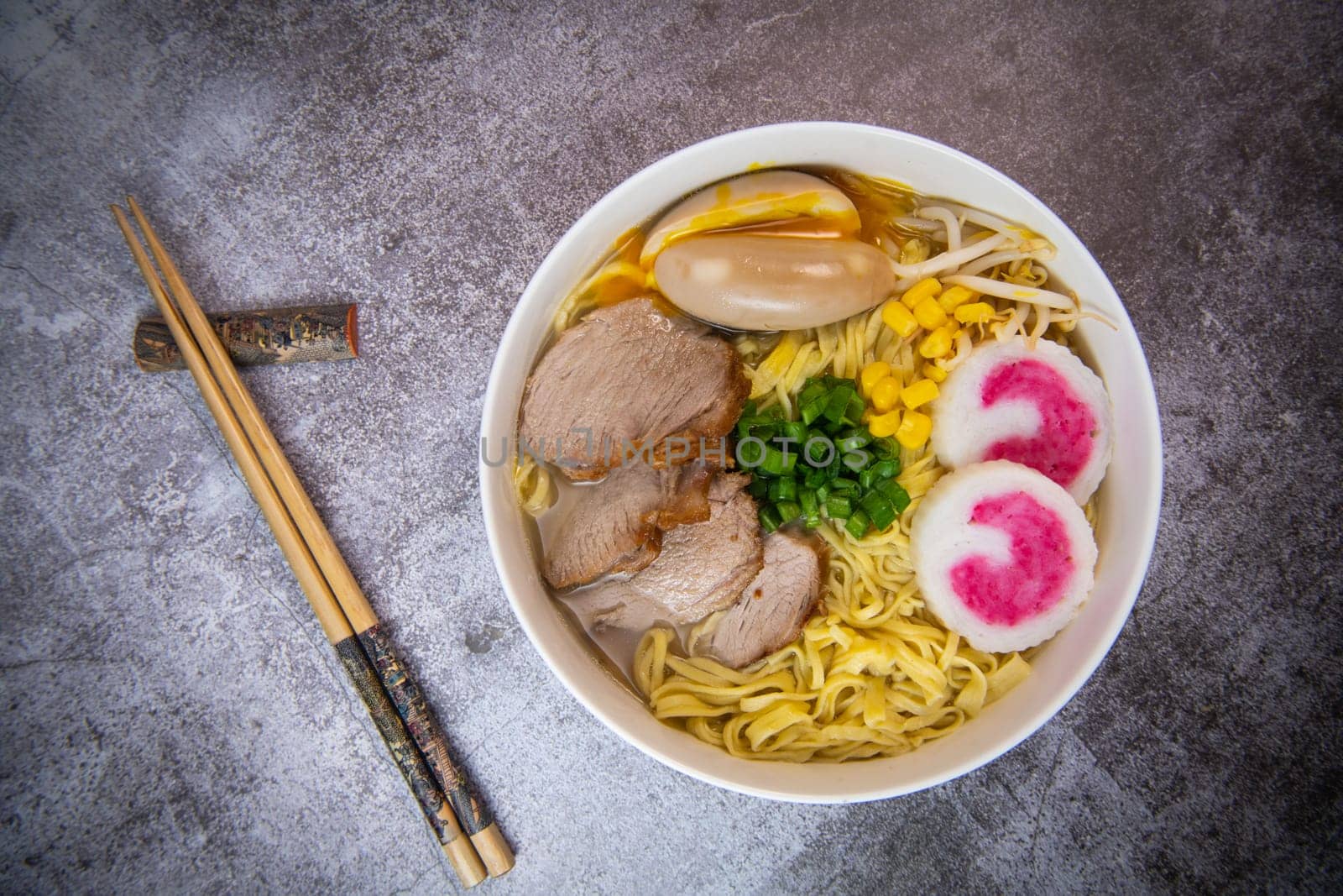 Fresh ramen noodles with garnish, pork tenderloin, eggs marinated in Mirin and soy sauce, bean sprouts, corn, nori leaf, spring onion, and homemade Narutomaki with codfish back, Hight quality