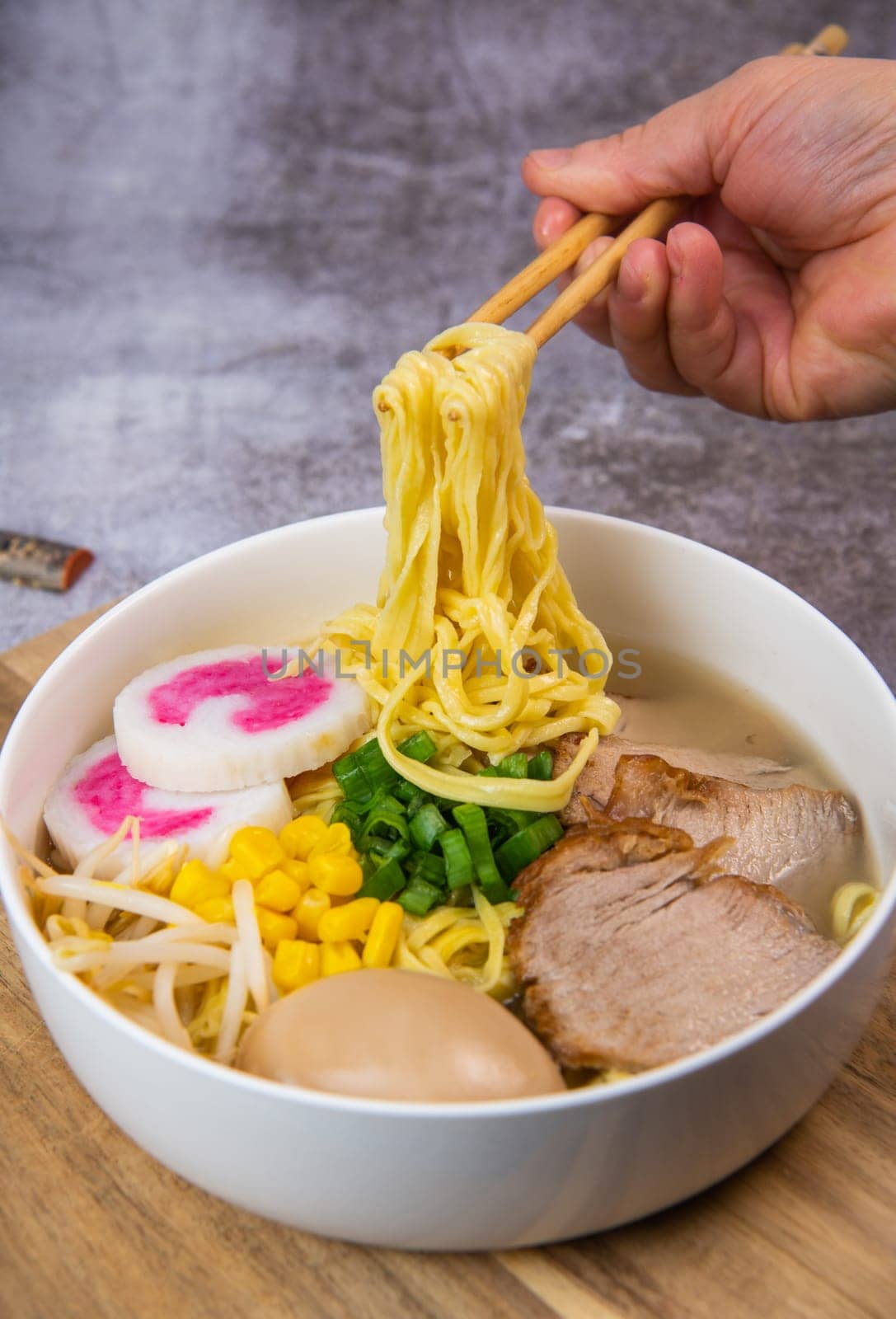 Fresh ramen noodles with garnish, pork tenderloin, eggs marinated in Mirin and soy sauce, bean sprouts, corn, nori leaf, spring onion, and homemade Narutomaki with codfish back, Hight quality