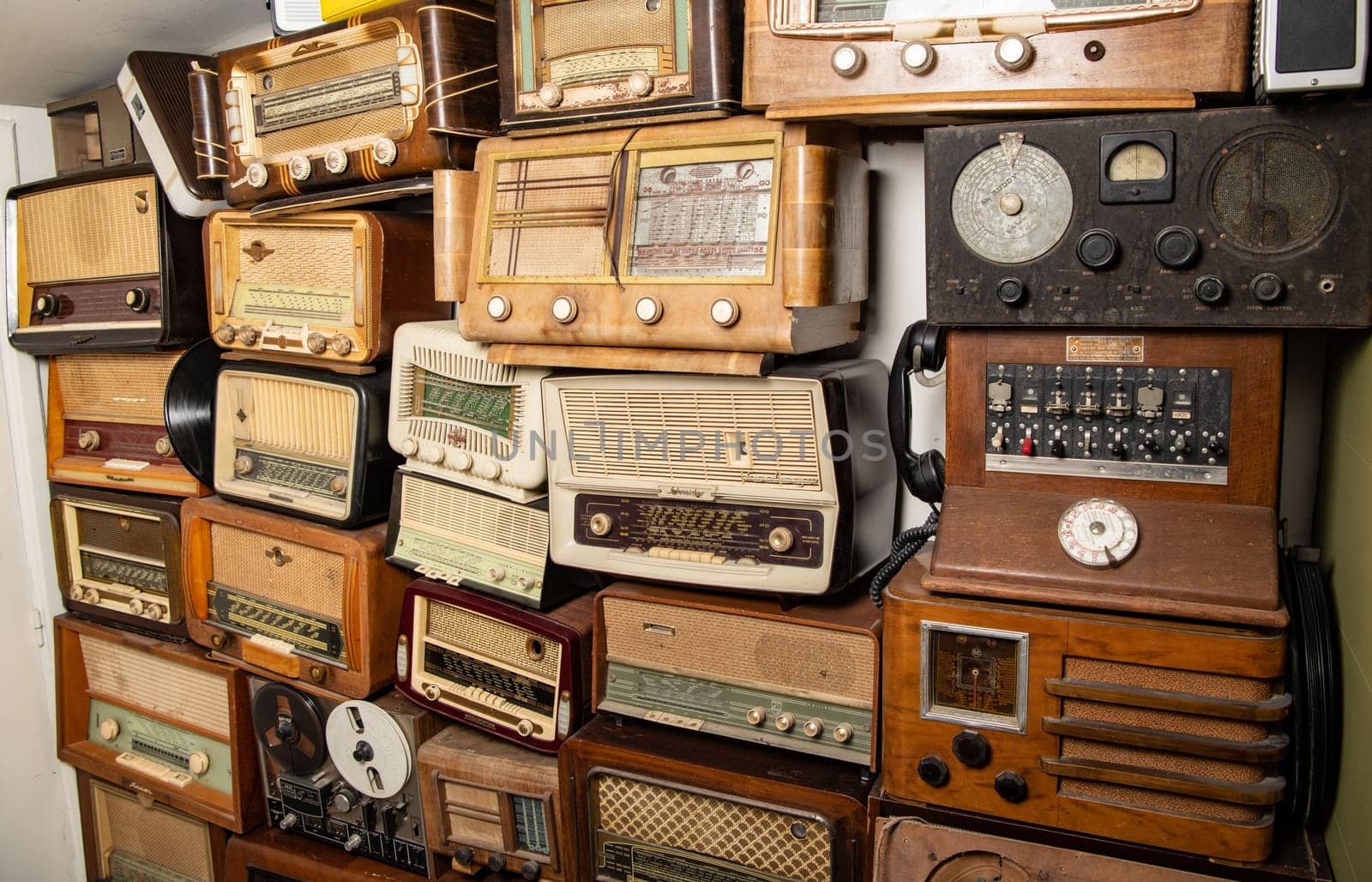 Collection of retro radio and telephone receivers circa 1950. Listening to music. Vintage instagram old style filtered photo, High quality photo
