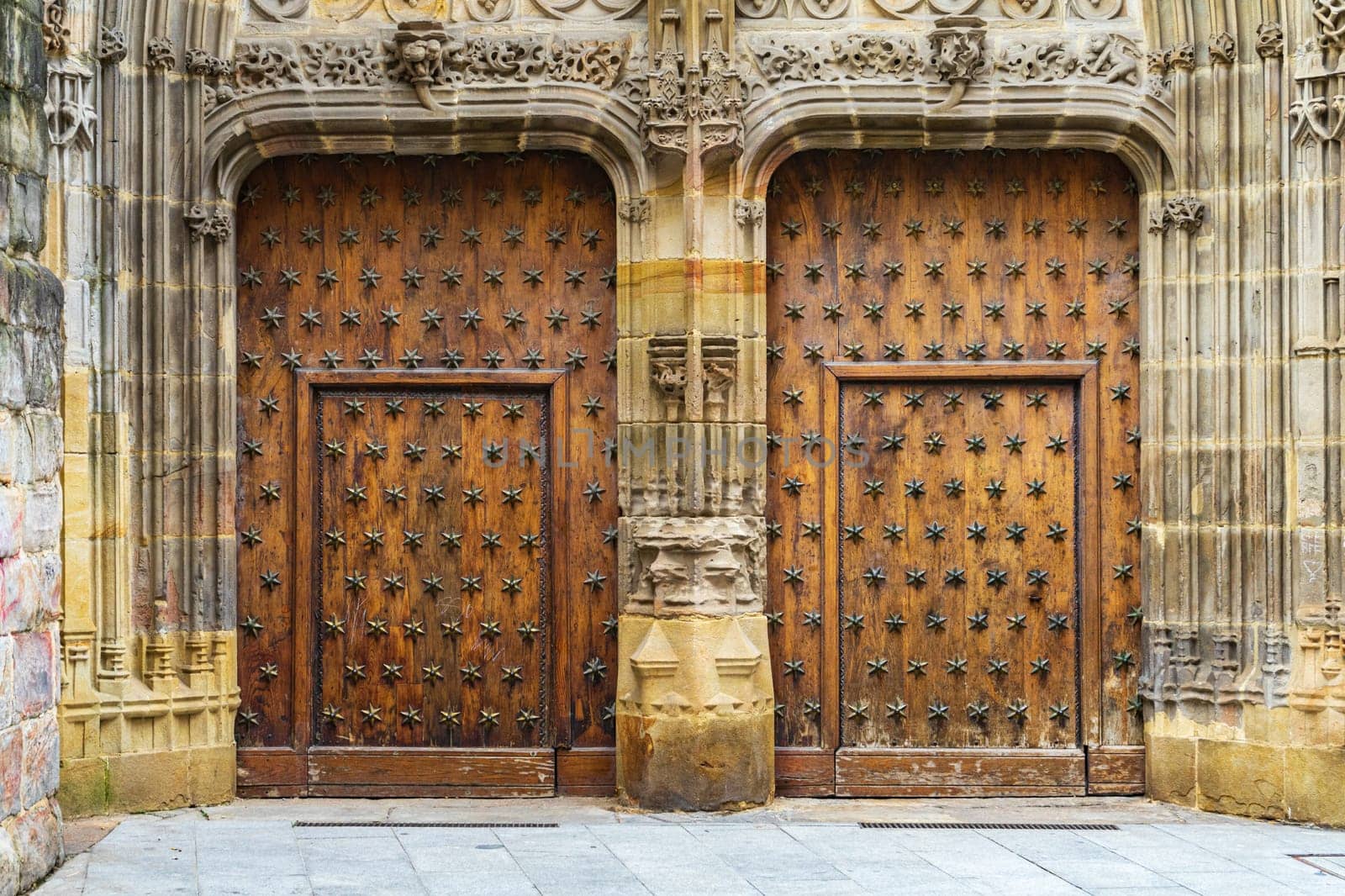 Old wooden doors Cathedral of Santiago, Bilbao, Spain. by paca-waca