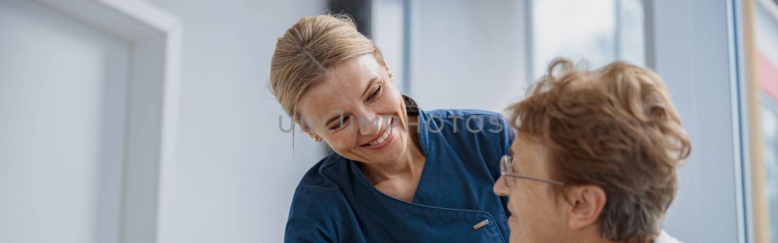 Female patient signing treatment agreement in doctor's office in clinic. High quality photo
