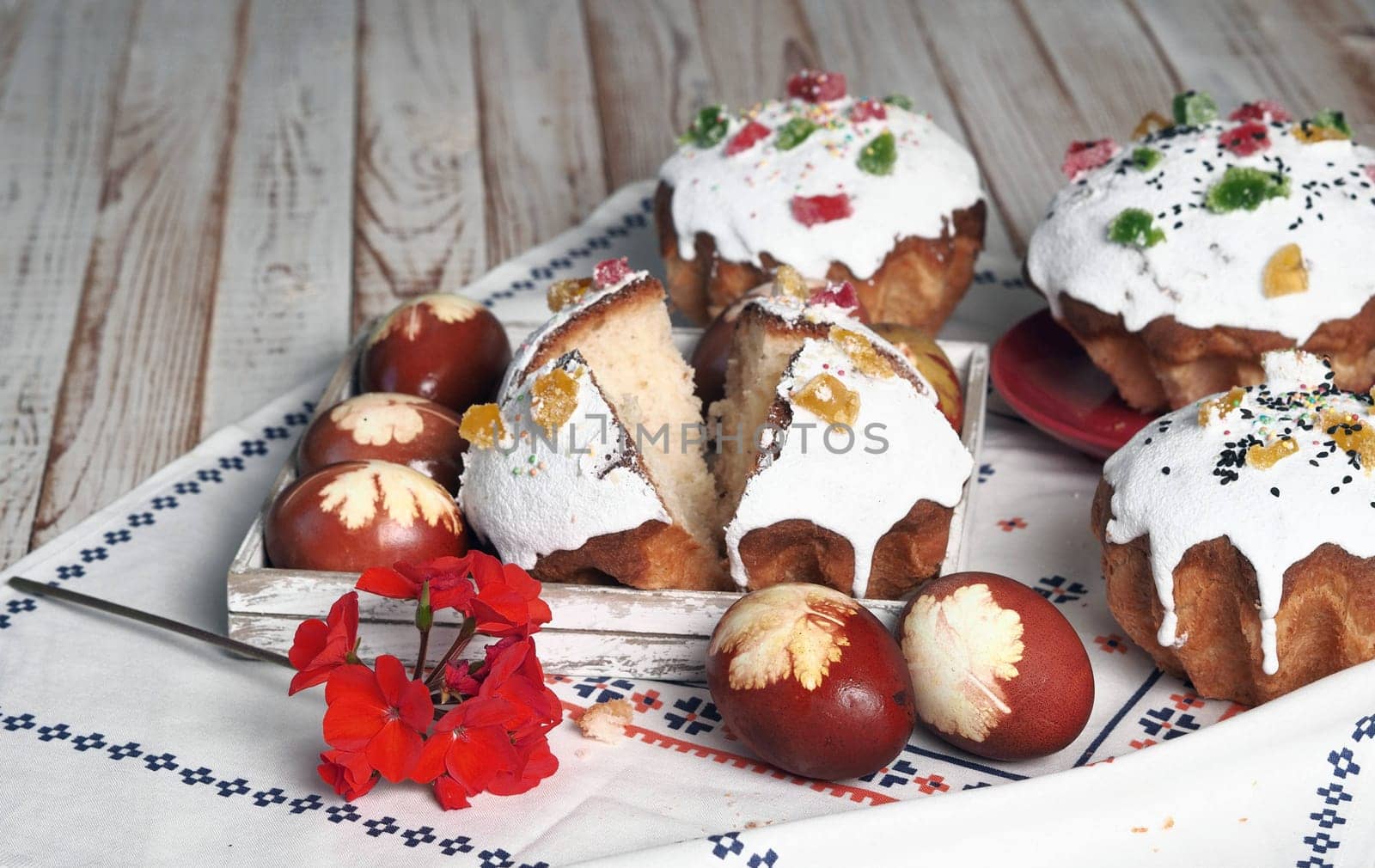 The concept of delicious Easter food, close up.Easter baking with eggs on a white wooden table. by TatianaPink