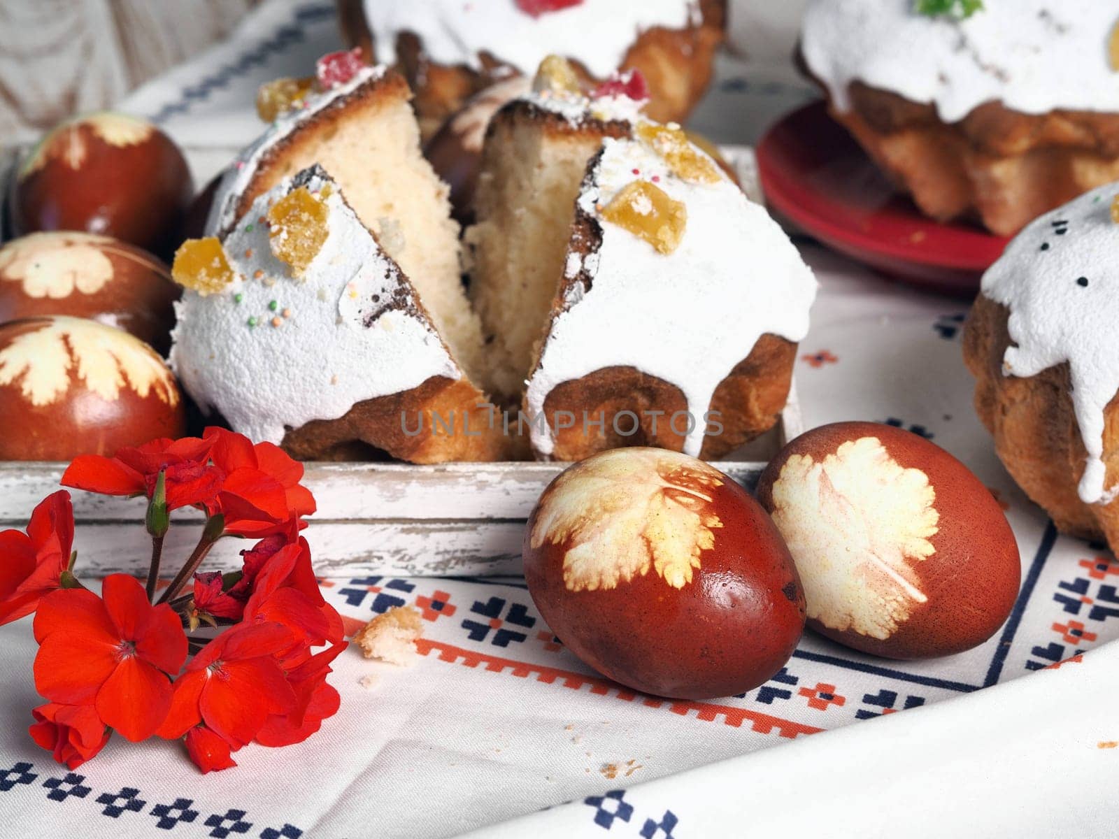 The concept of delicious Easter food, close up.Easter baking with eggs on a white wooden table. by TatianaPink