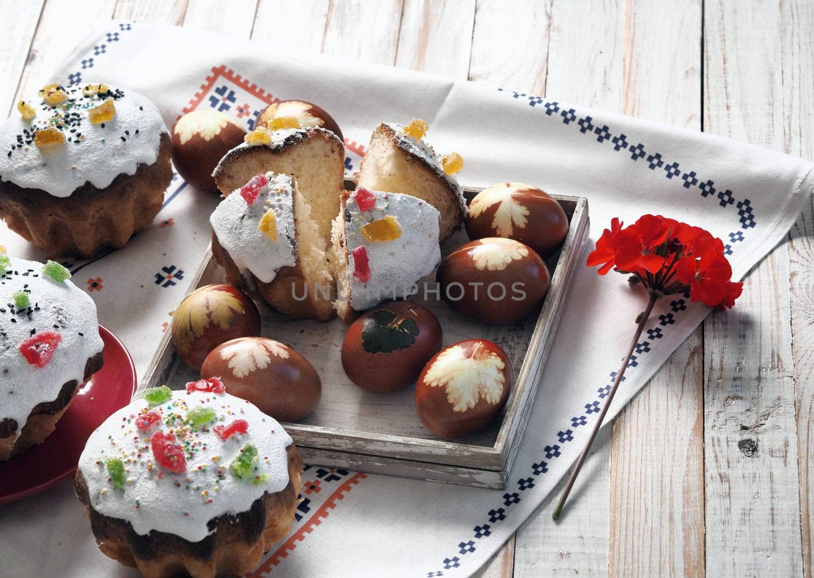 The concept of delicious Easter food, close up.Easter baking with eggs on a white wooden table. by TatianaPink