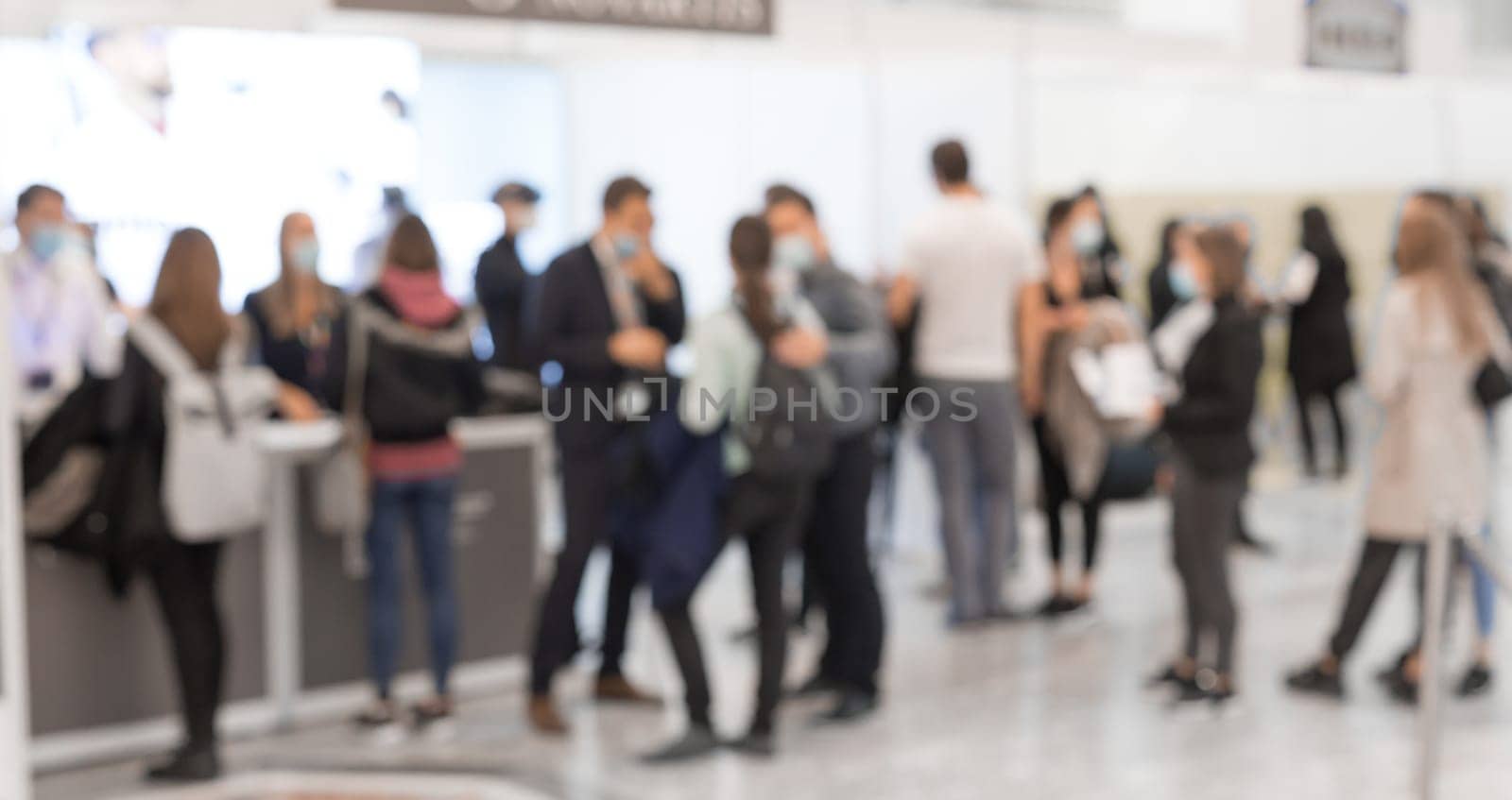 Abstract blured people at exhibition hall of expo event trade show. Business convention show or job fair. Business concept background