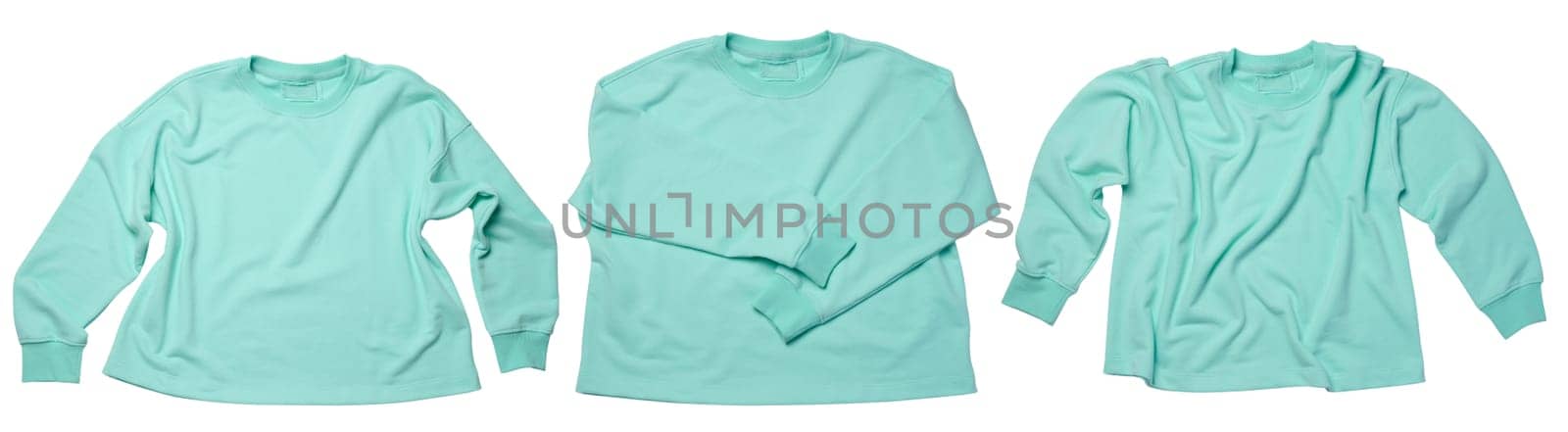 Light green knitted pullover on a white isolated background, comfortable wear