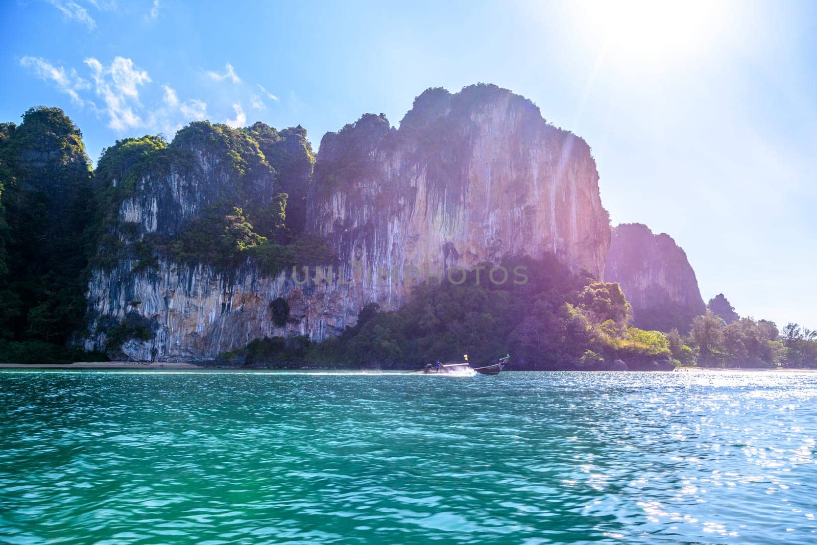 Cliff rocks with azure water in Tonsai Bay, Railay Beach, Ao Nang, Krabi, Thailand by Eagle2308