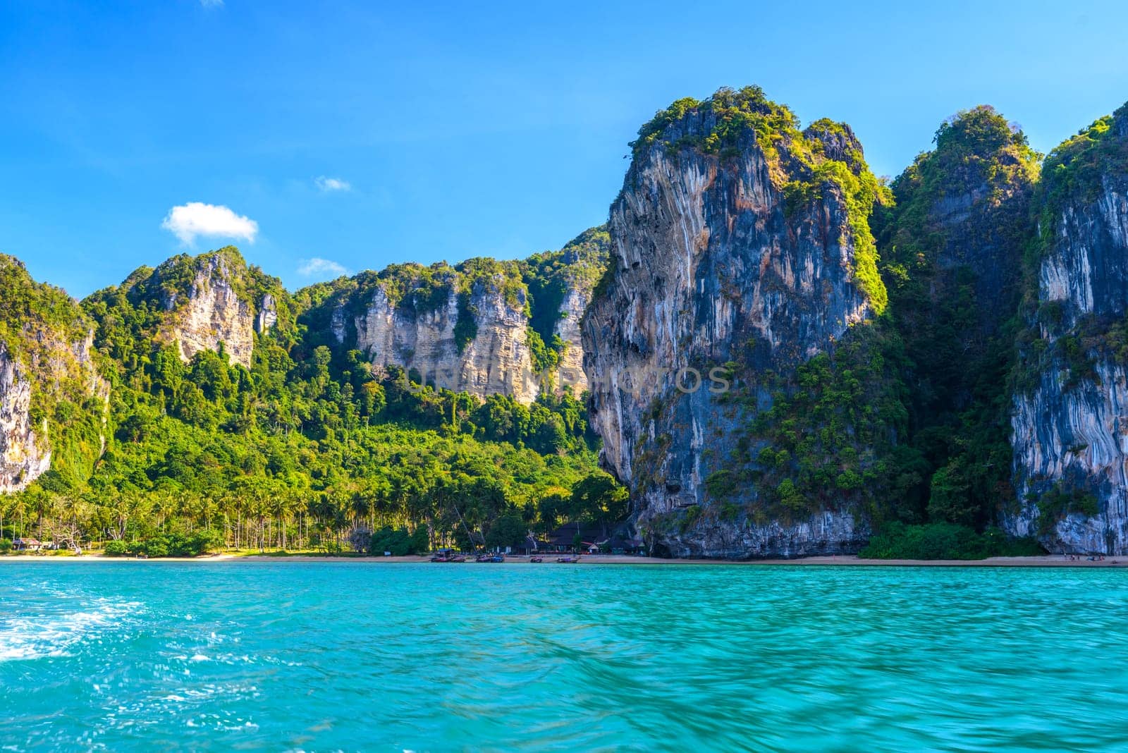 Cliff rocks with azure water in Tonsai Bay, Railay Beach, Ao Nang, Krabi, Thailand.