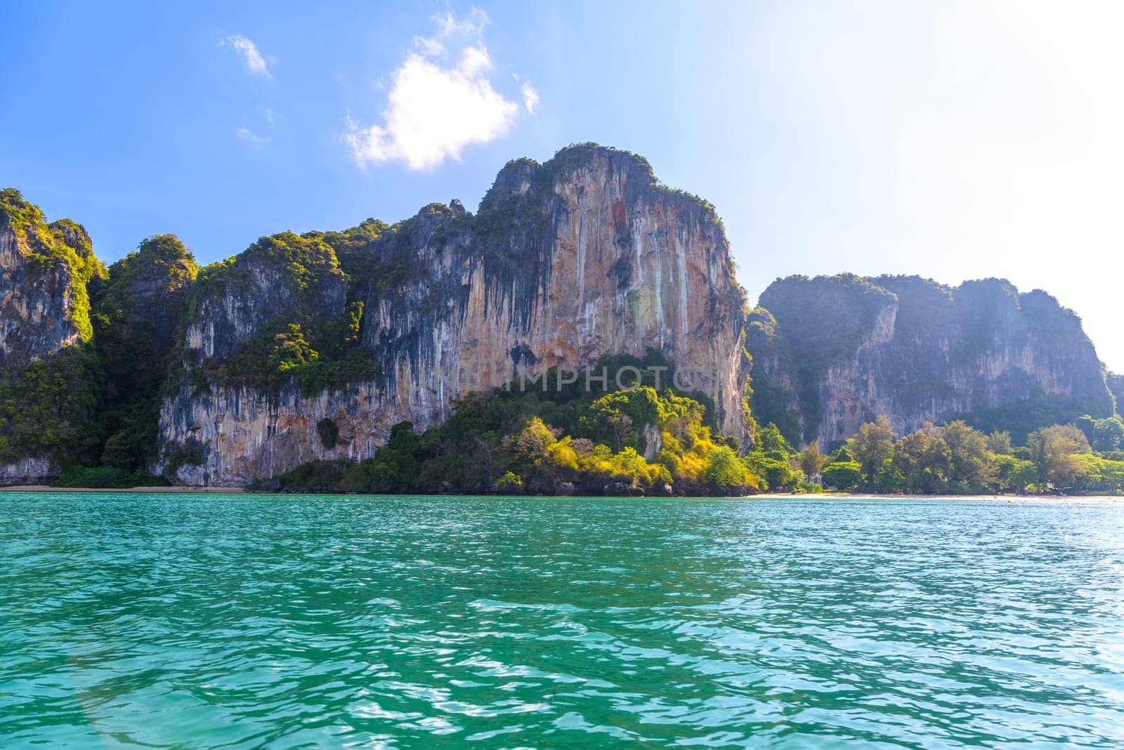 Cliff rocks with azure water in Tonsai Bay, Railay Beach, Ao Nang, Krabi, Thailand.