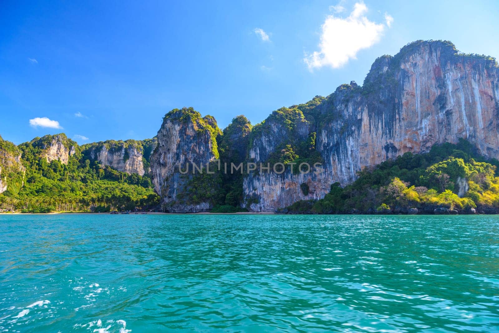 Cliff rocks with azure water in Tonsai Bay, Railay Beach, Ao Nang, Krabi, Thailand by Eagle2308