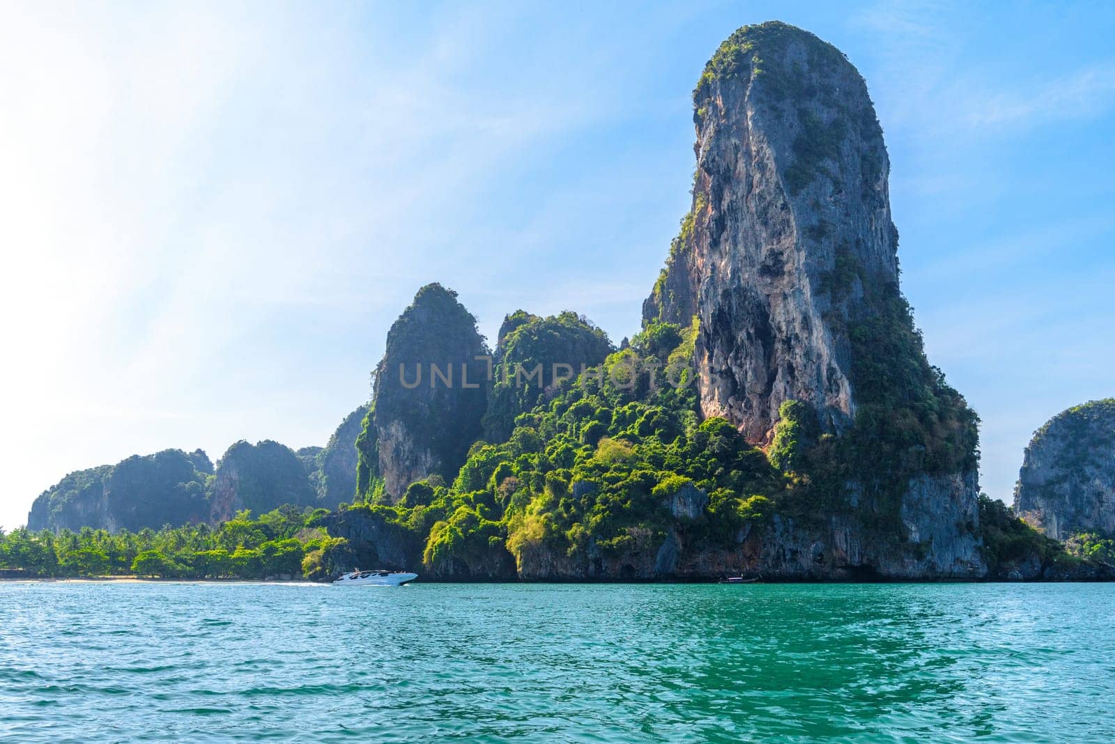 Cliff rock in azure water, Ko Rang Nok, Ao Phra Nang Beach, Ao Nang, Krabi, Thailand.