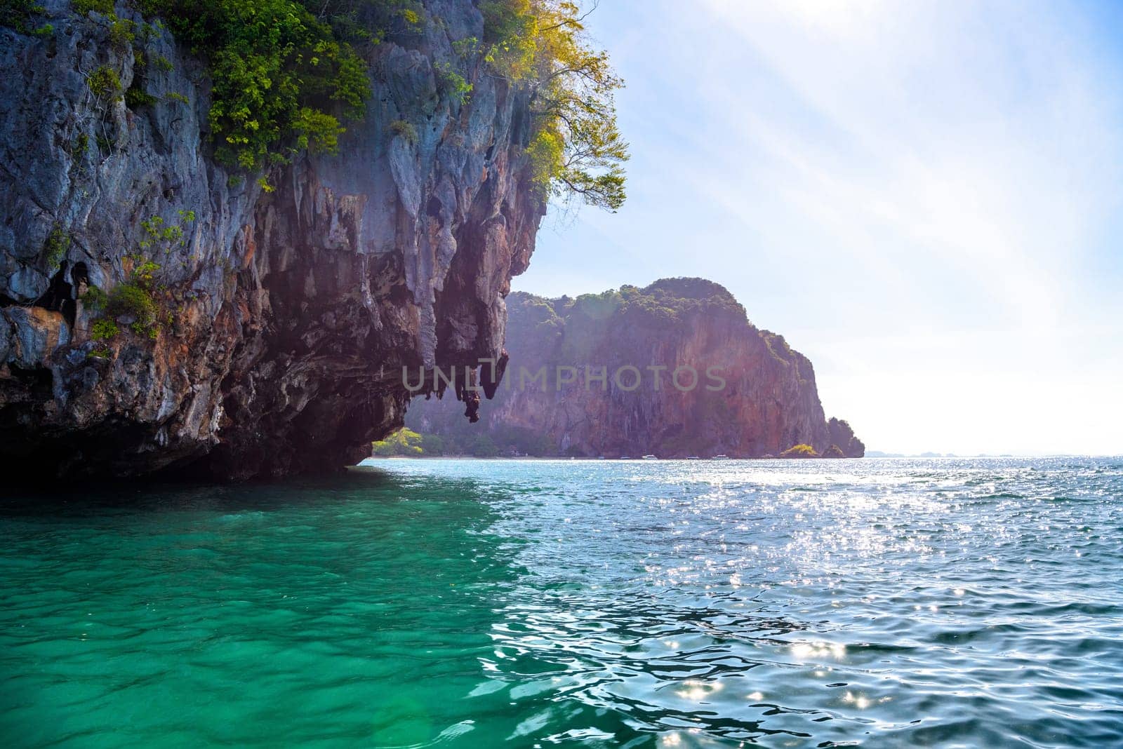 Huge cliff rock in azure water, Railay beach, Ao Nang, Krabi, Thailand by Eagle2308