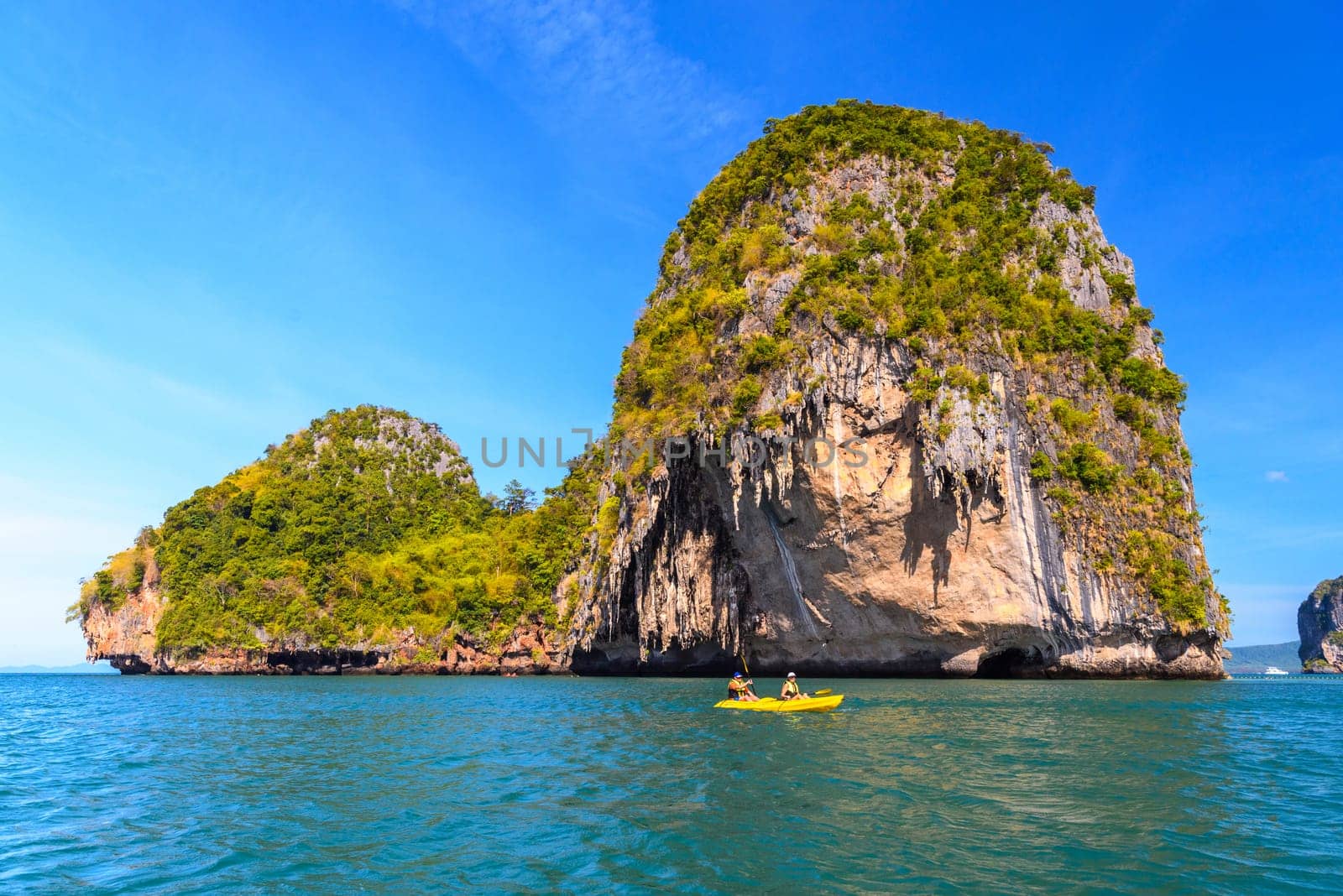 Huge cliff rock in azure water, Ko Rang Nok, Ao Phra Nang Beach, Ao Nang, Krabi, Thailand.