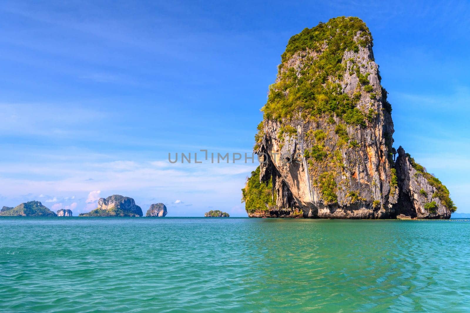 Huge cliff rock in azure water, Ko Rang Nok, Ao Phra Nang Beach, Ao Nang, Krabi, Thailand by Eagle2308