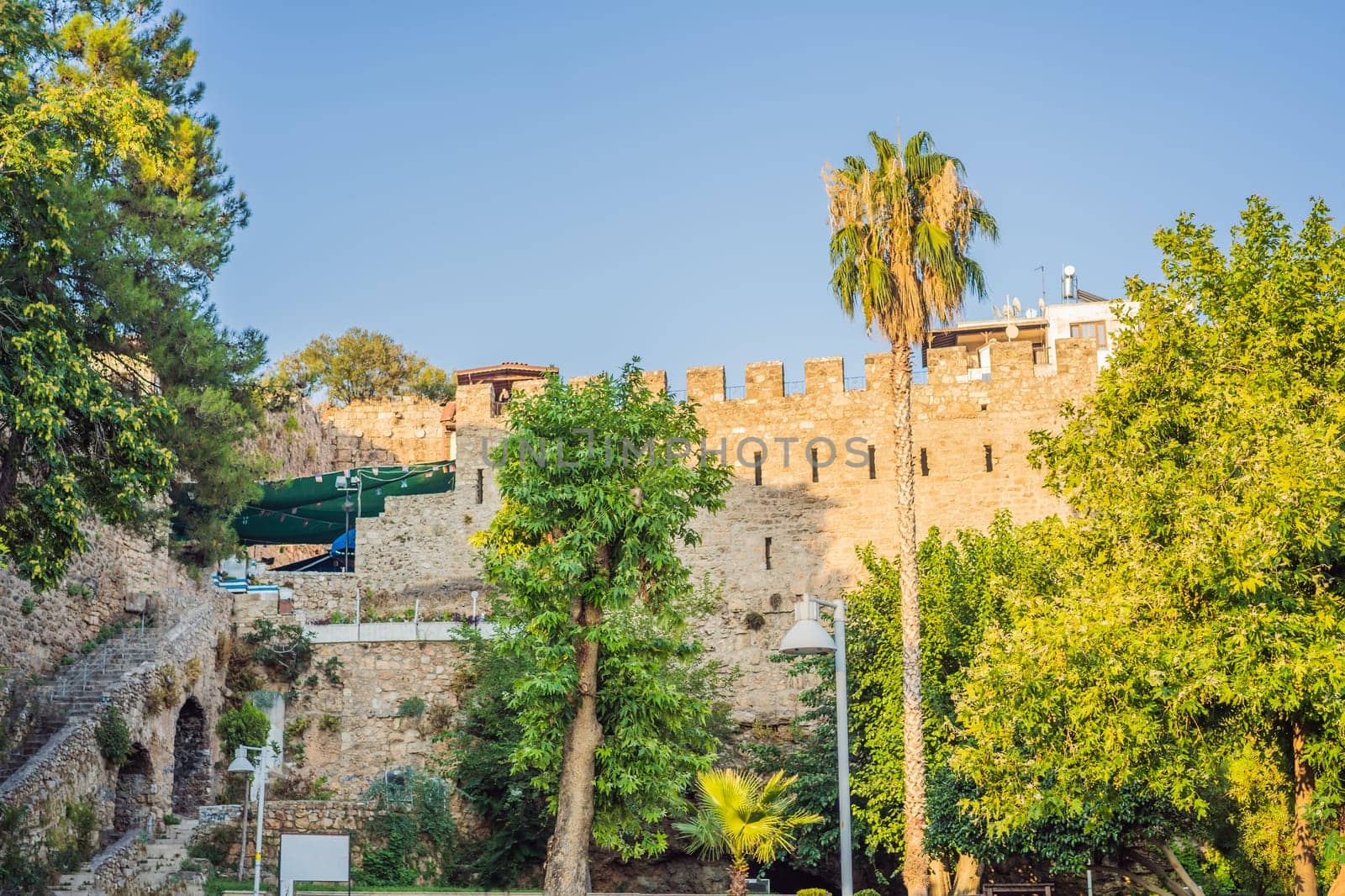 Old town Kaleici in Antalya. Panoramic view of Antalya Old Town port, Taurus mountains and Mediterrranean Sea, Turkey by galitskaya