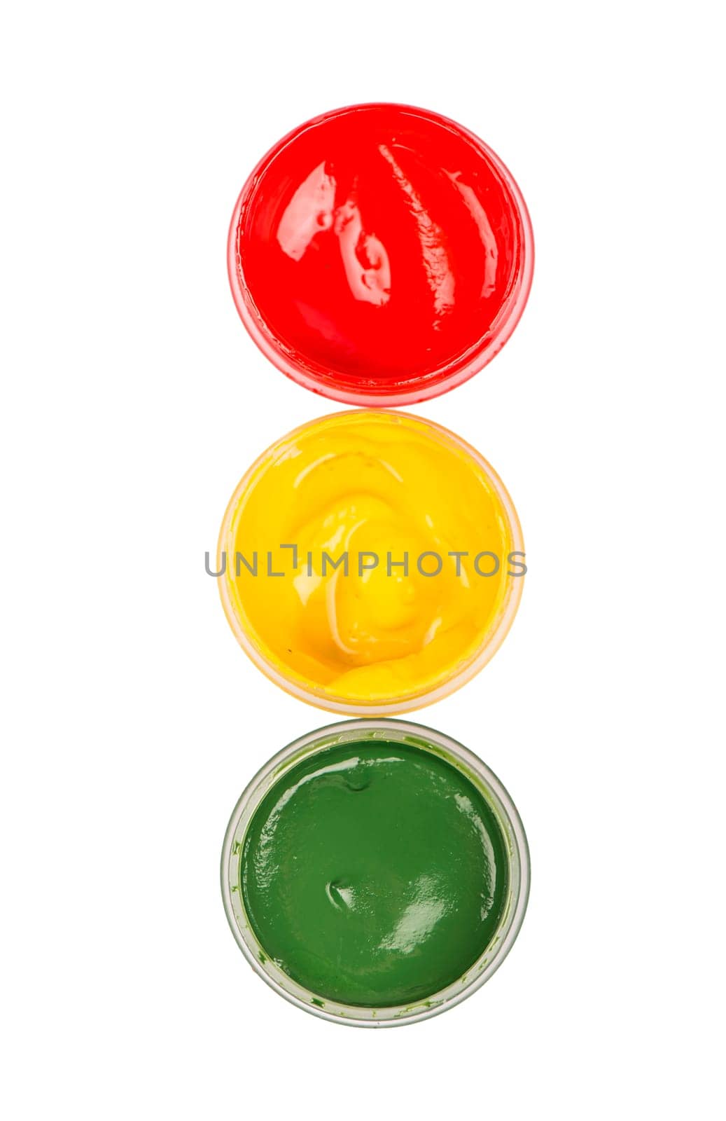 We draw a traffic light. Traffic light symbol of the rules of the road. Opened three cans with paint like a traffic light isolated on a white background by aprilphoto
