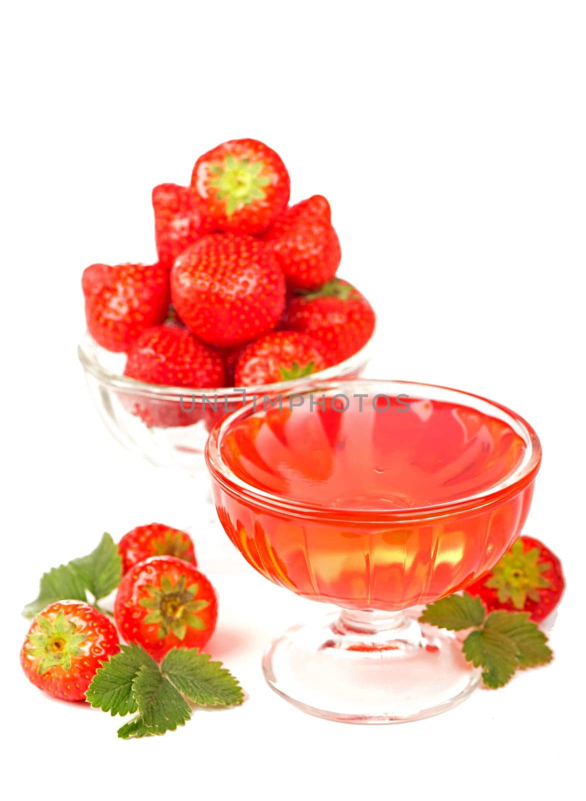 Cream bowl, bowl with fresh strawberries and sweet strawberry jelly against white background by aprilphoto