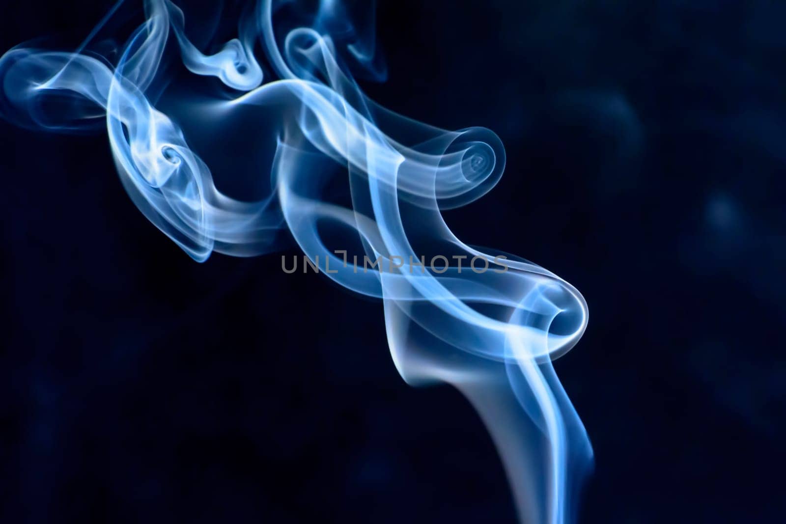 The smoke is colorful. It is abstract.