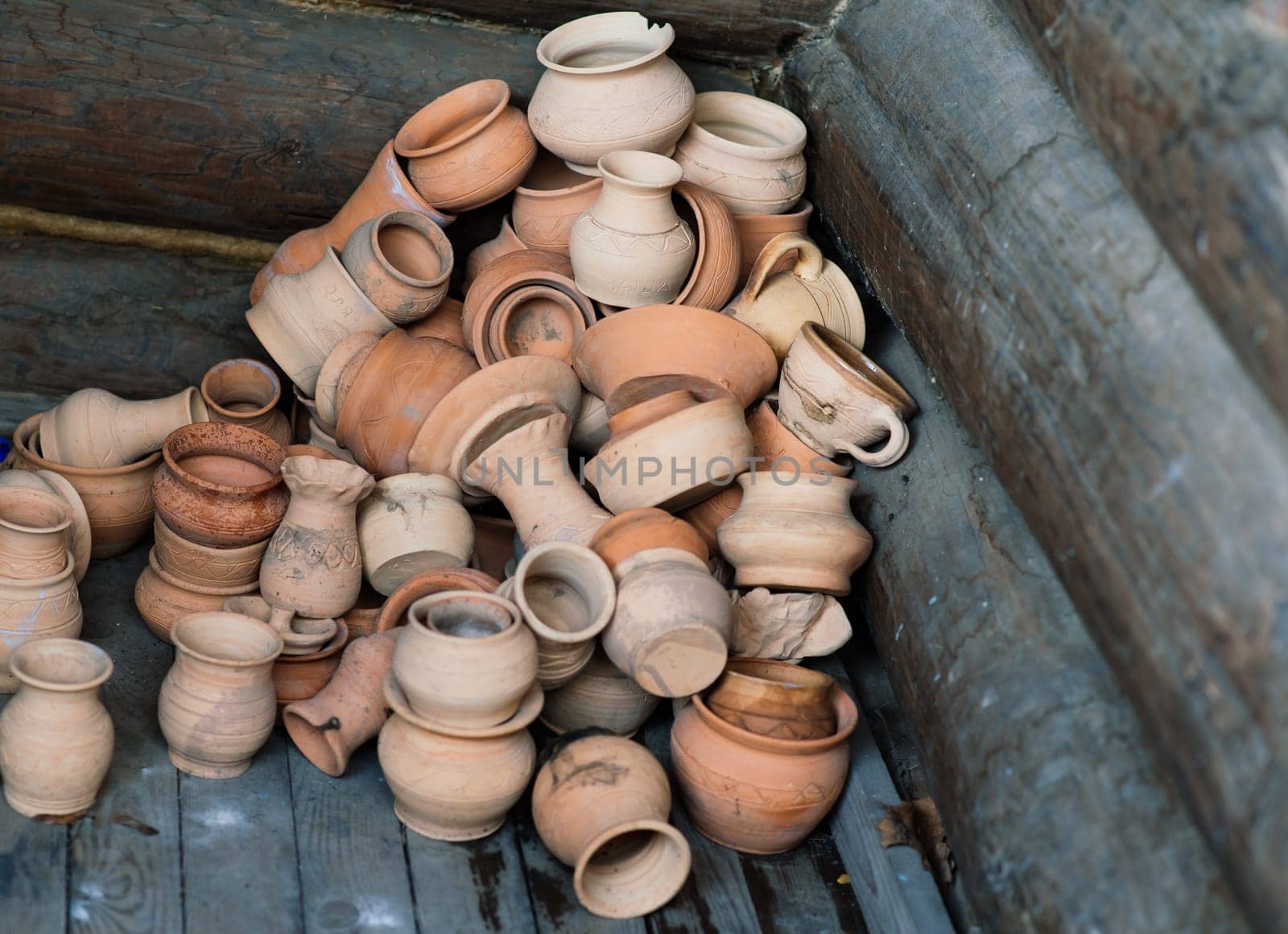 Ceramic clay terracotta jug, pot, vase, kitchen souvenirs in handmade ceramics street store.