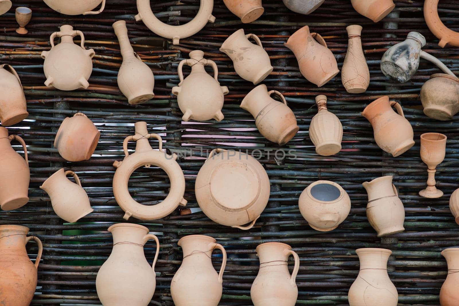 Ceramic clay terracotta jug, pot, vase, kitchen souvenirs in handmade ceramics street store.