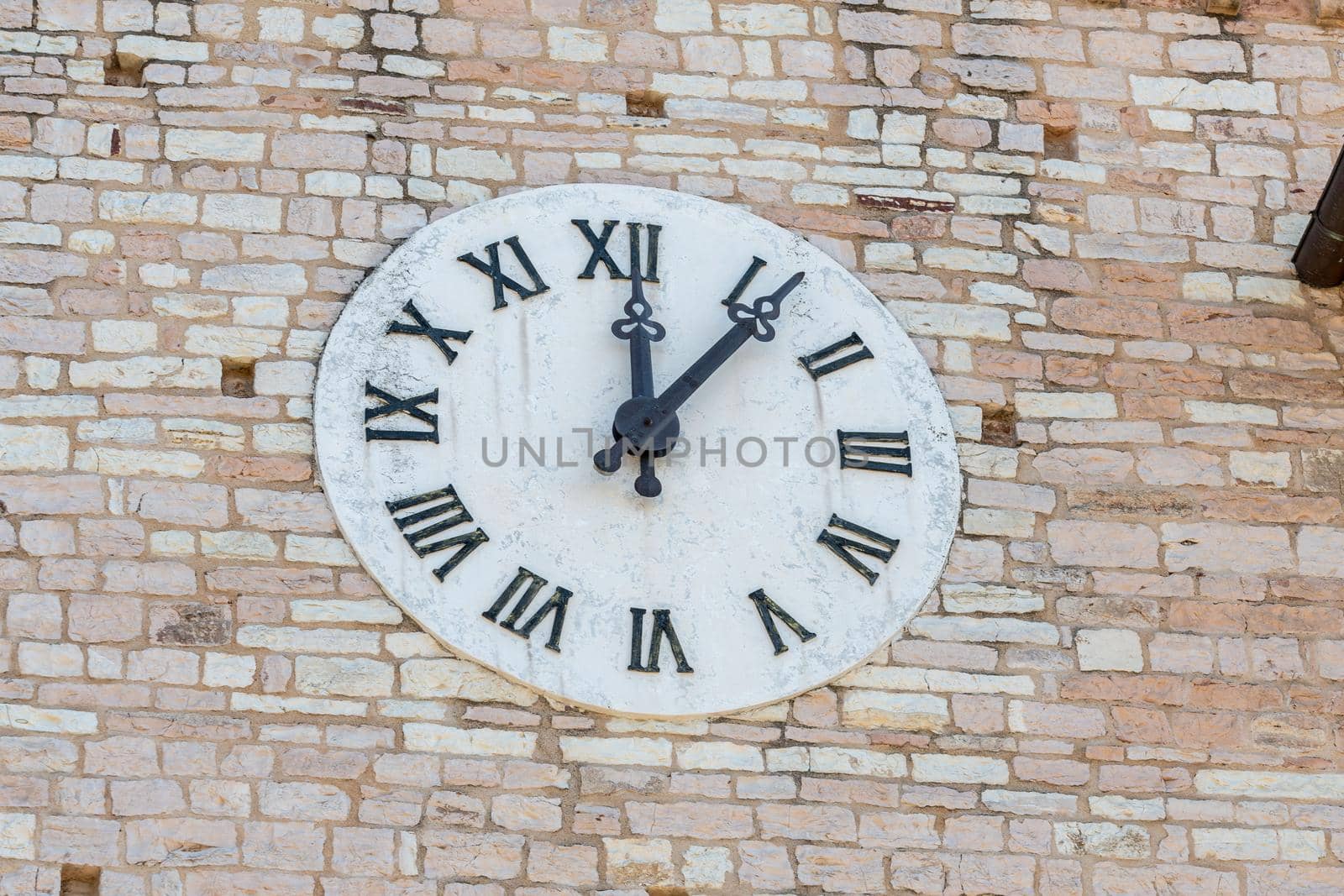 detail of the clock of the church of santa maria magiore spello