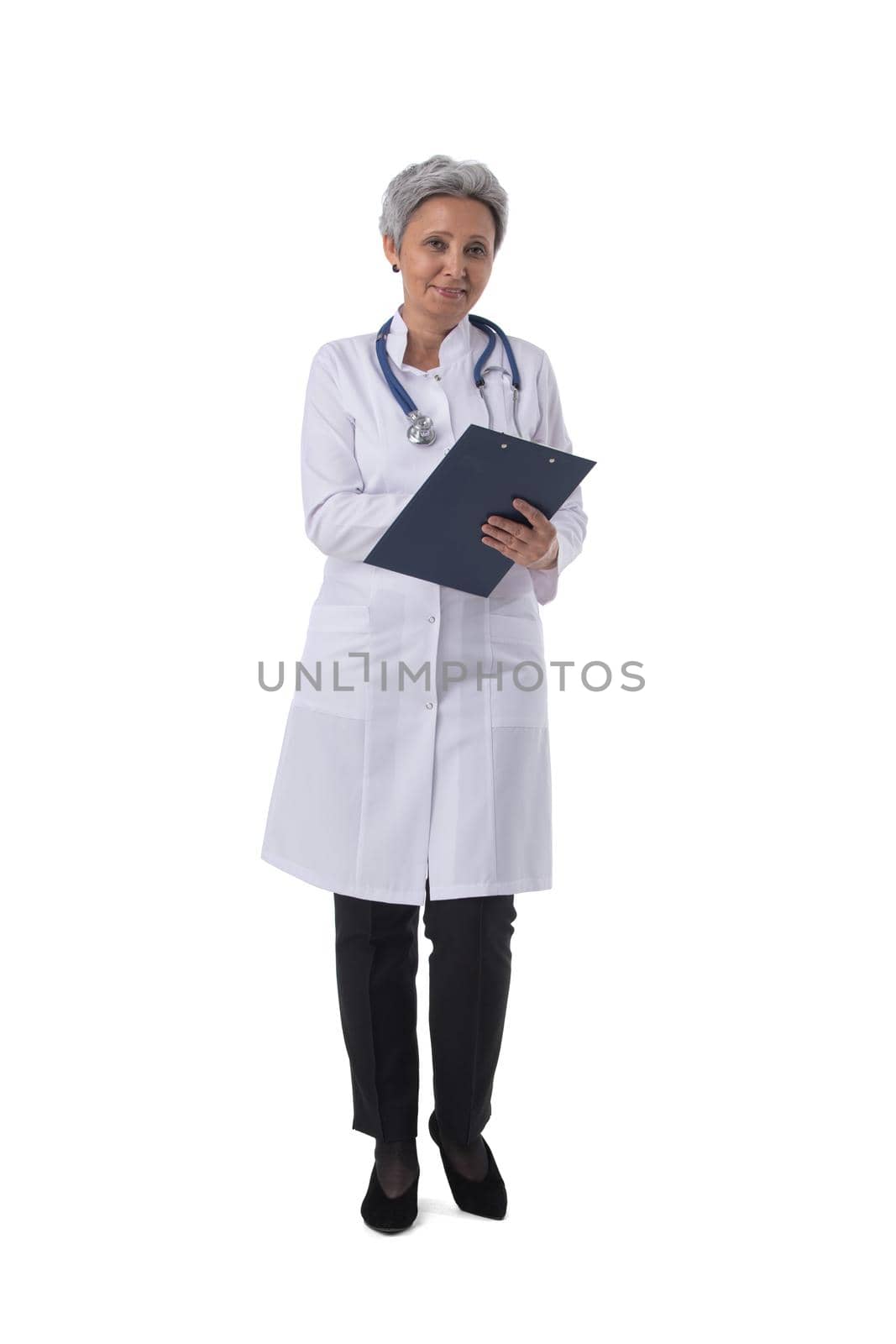 Portrait of mature Asian doctor with stethoscope write on board isolated over white background