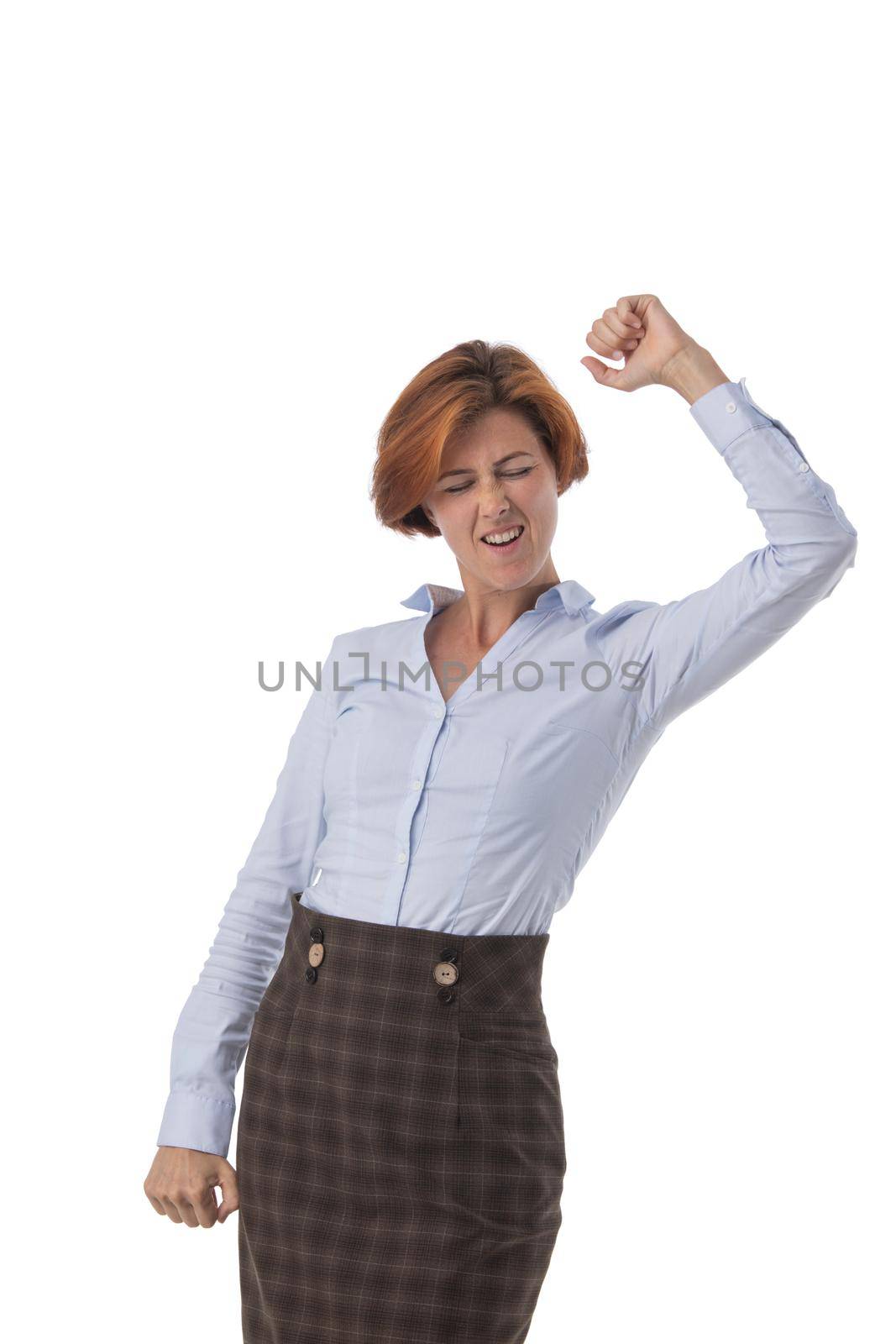 Business woman excited hold fist hand up raised arm, surprised happy smile business woman isolated over white background, concept winner success