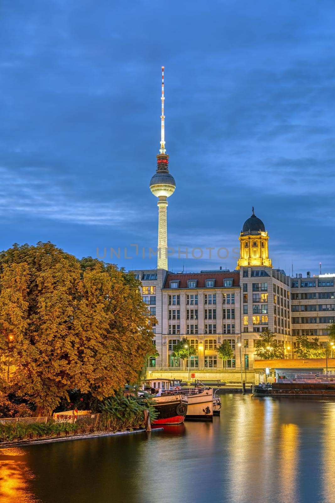 The river Spree in Berlin at night with the TV Tower in the back