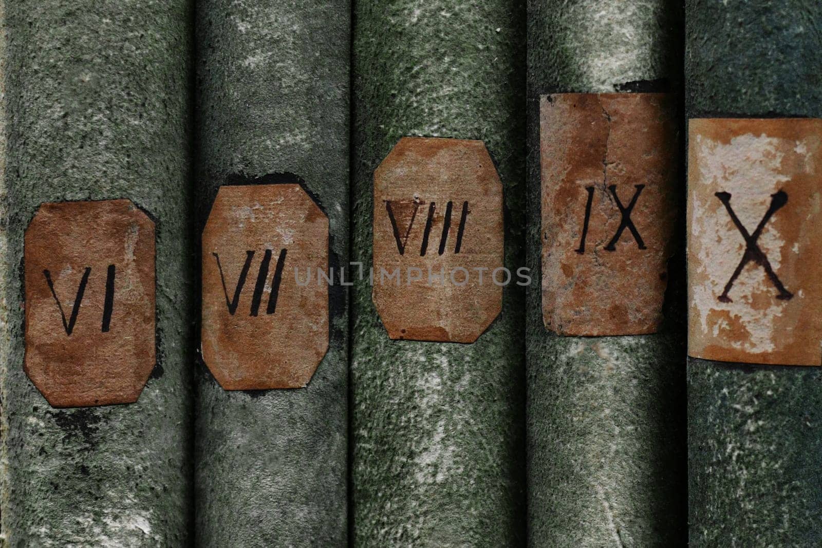 Old books with Roman numerals in the library archive