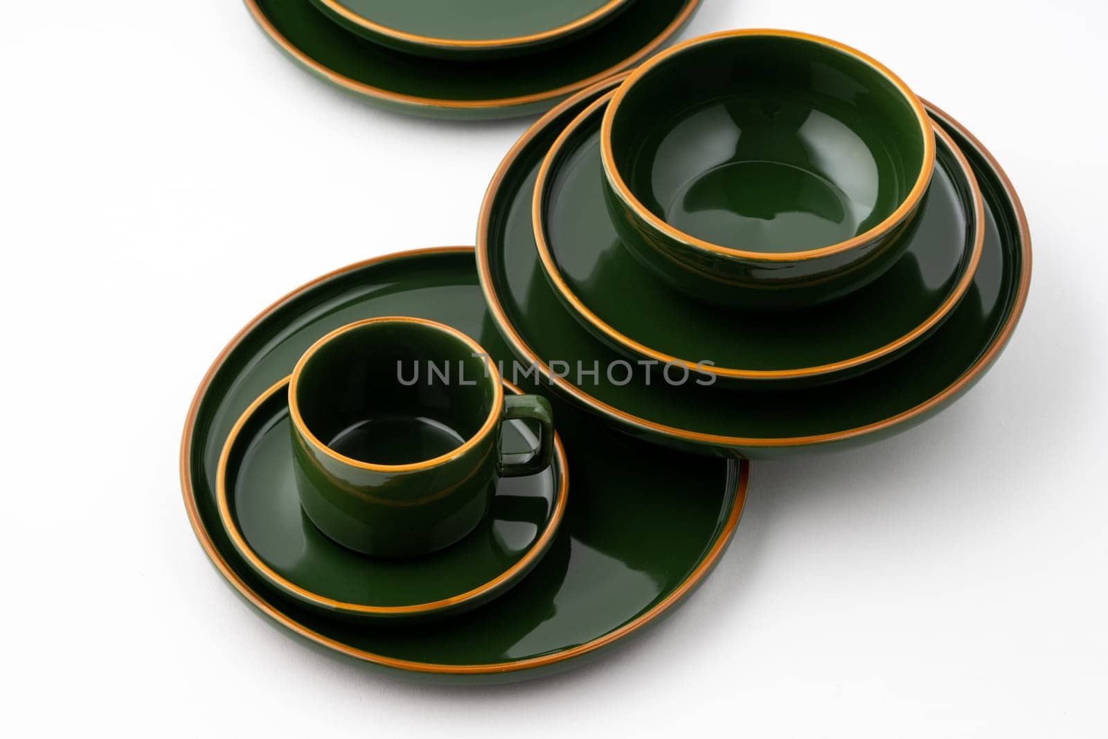 A set of dark green ceramic tableware with orange outlines by A_Karim