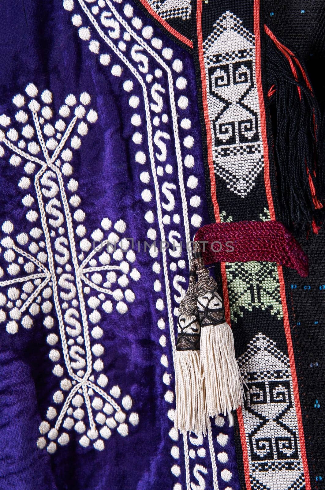 The decorative elements and ornaments on the national clothes of Uzbekistan