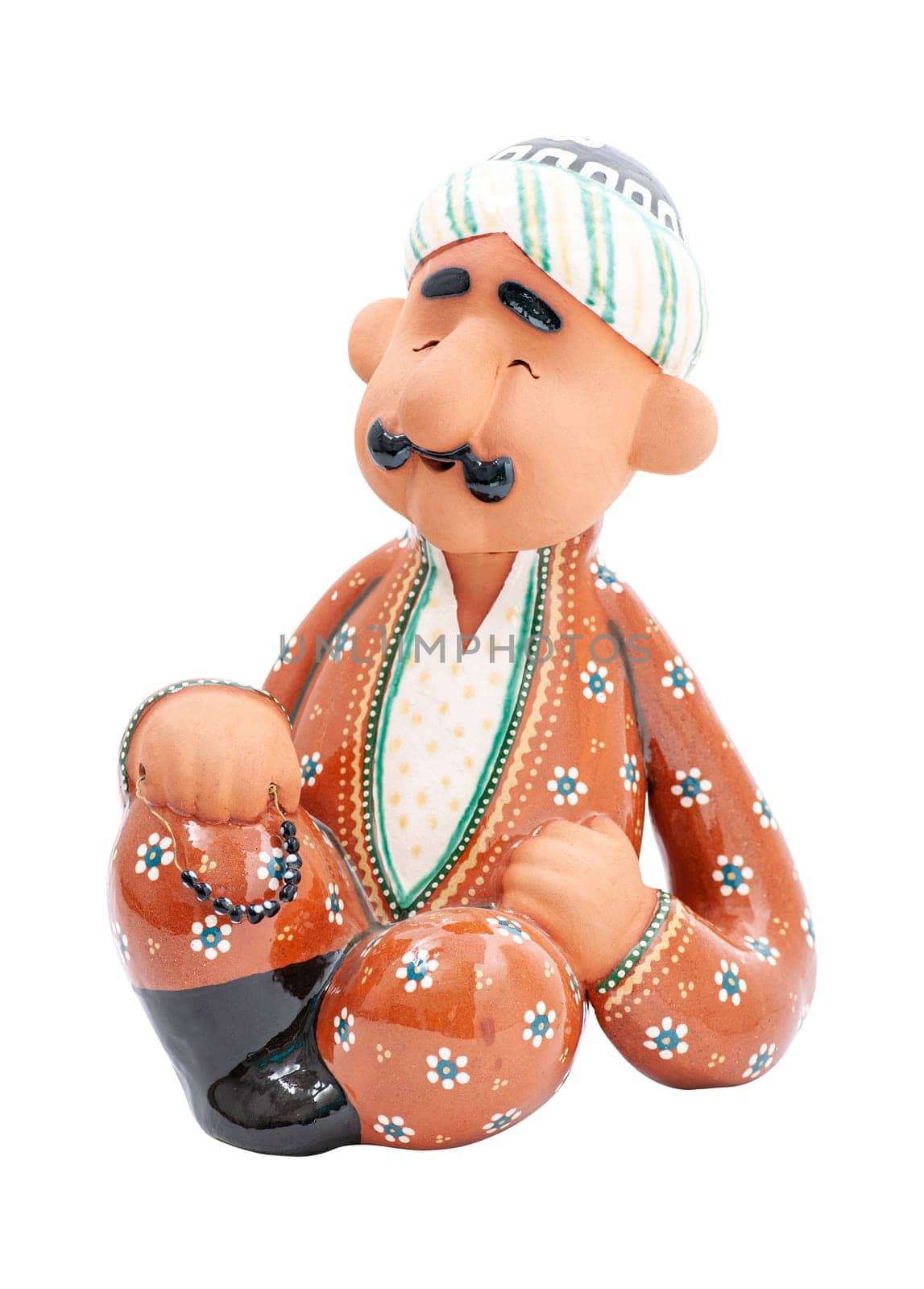 A grand father, clay oriental souvenir on a white background