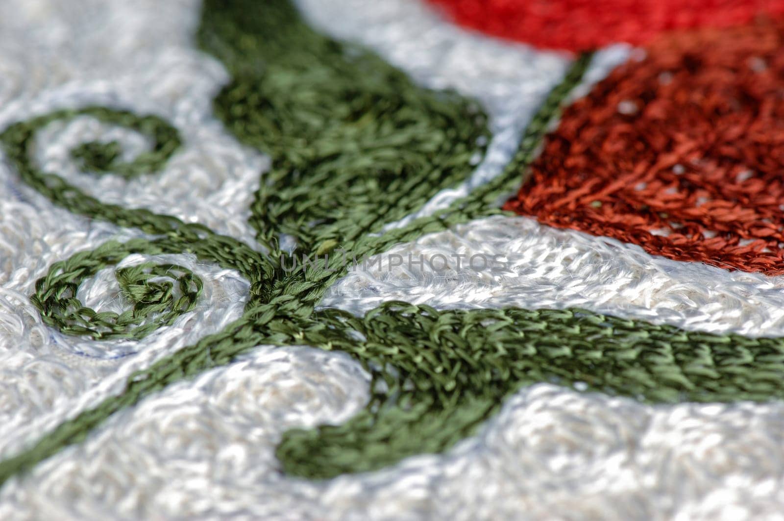 A closeup shot of national ornaments and patterns of Central Asia on a piece of cloth by A_Karim