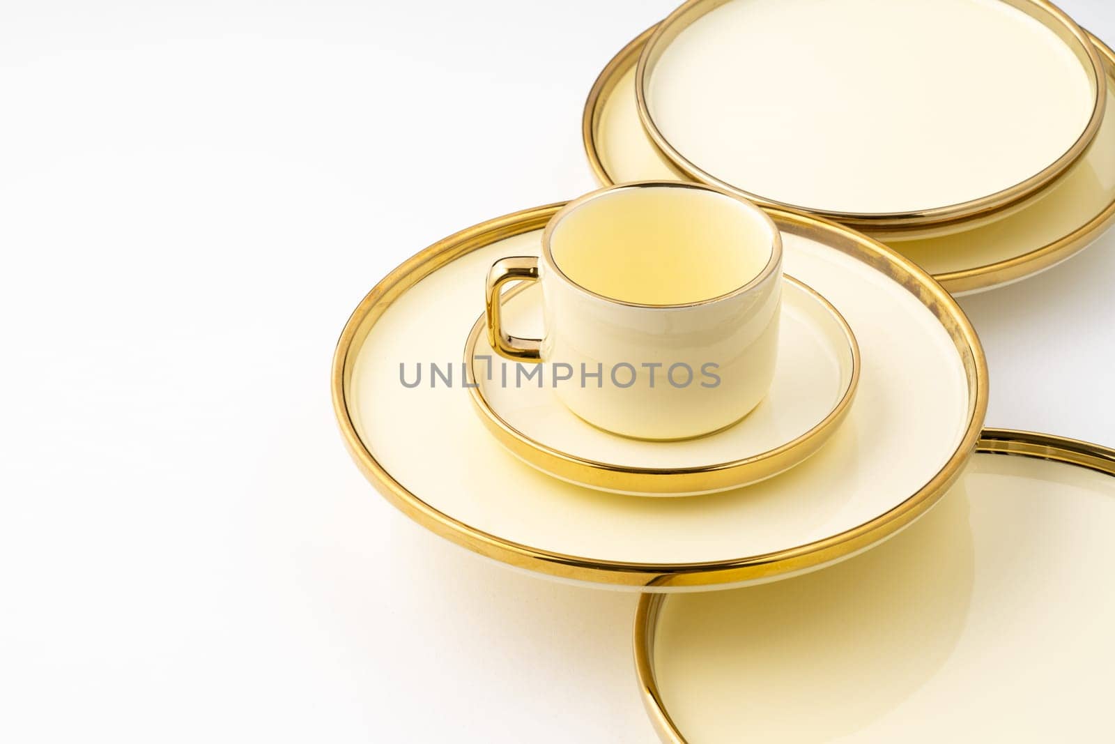 A set of golden luxury ceramic kitchen utensils on a white background by A_Karim
