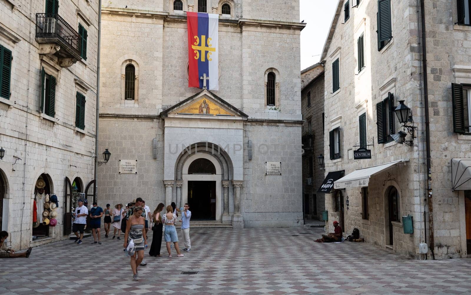Kotor, Montenegro - 27 June 2021: Ancient church in Kotor, Montenegro. Old chapel with beautiful european architecture with tourists