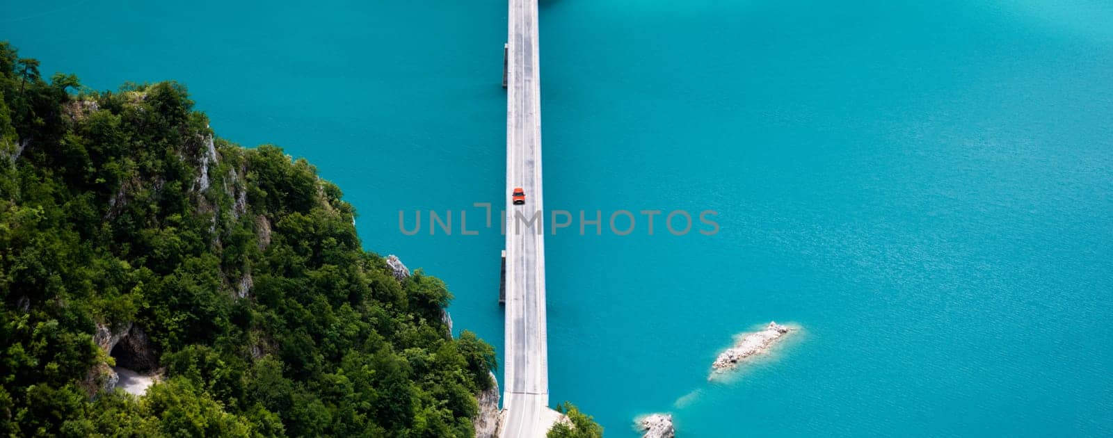 Scenic bridge over canyon lake Piva, Montenegro. Beautiful view on nature in national park from above