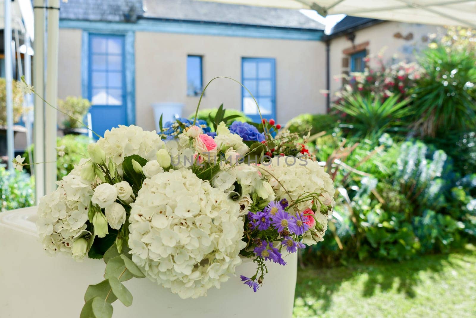 A bouquet of hydrangea, rose lisianthus and flowers in the garden