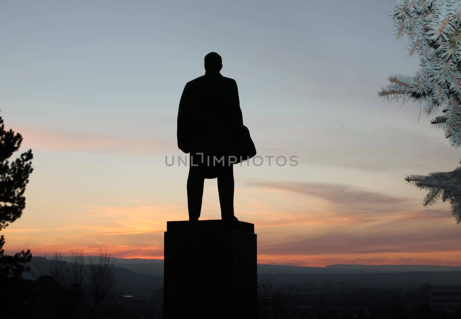 Monument of Vladimir Lenin on the sunset