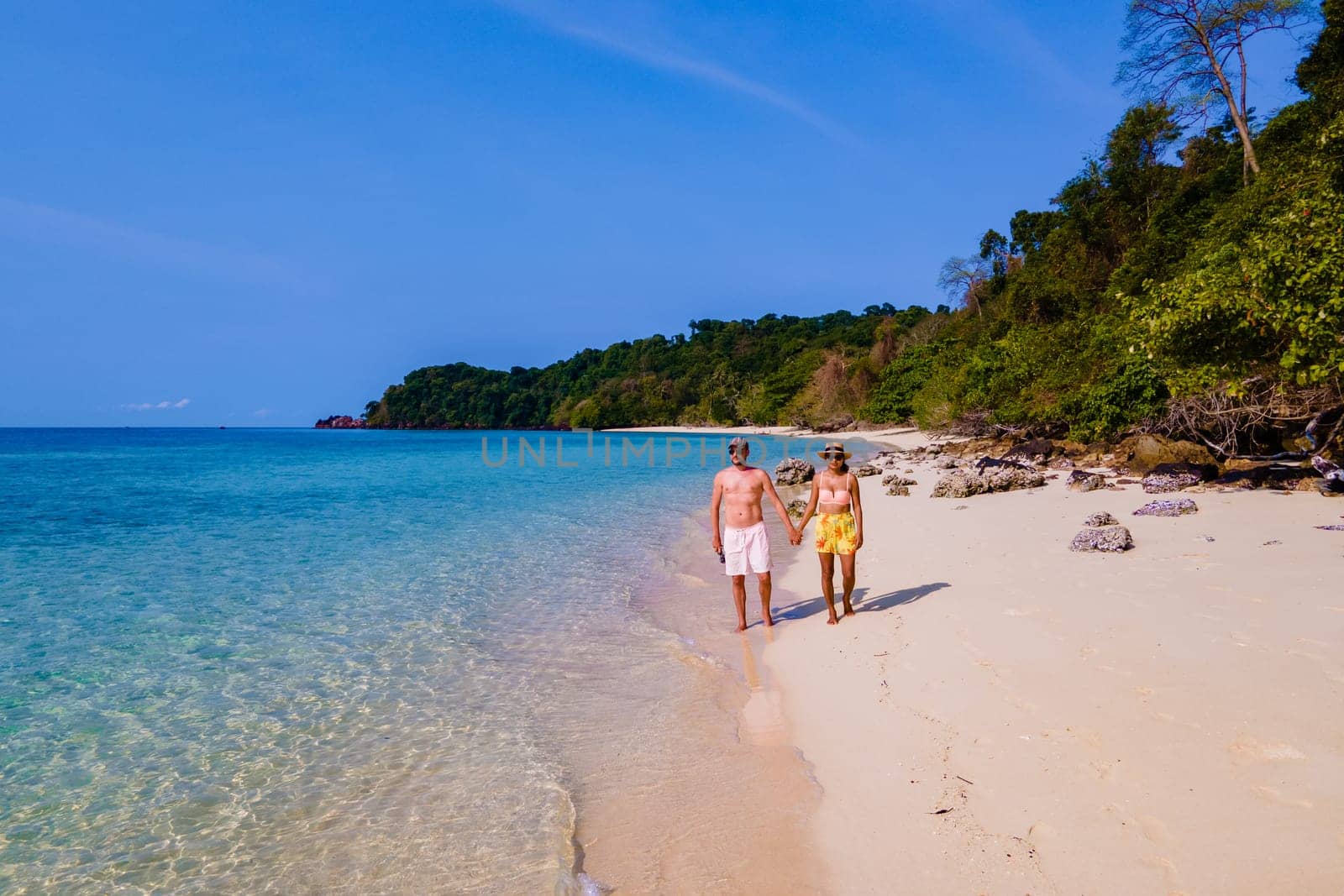 drone view at the beach of Koh Kradan island in Thailand, aerial view over Koh Kradan Island Trang during vacation in Thailand